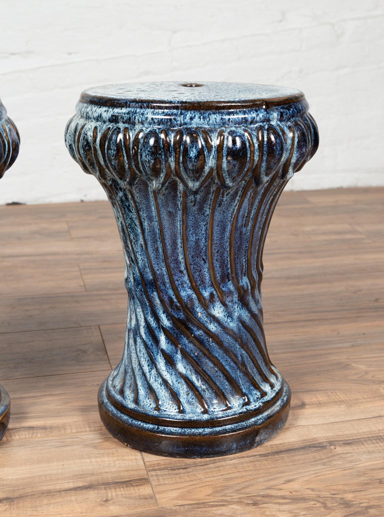 Two Vintage Blue Ceramic Garden Seats with Twisted Fluting, Sold