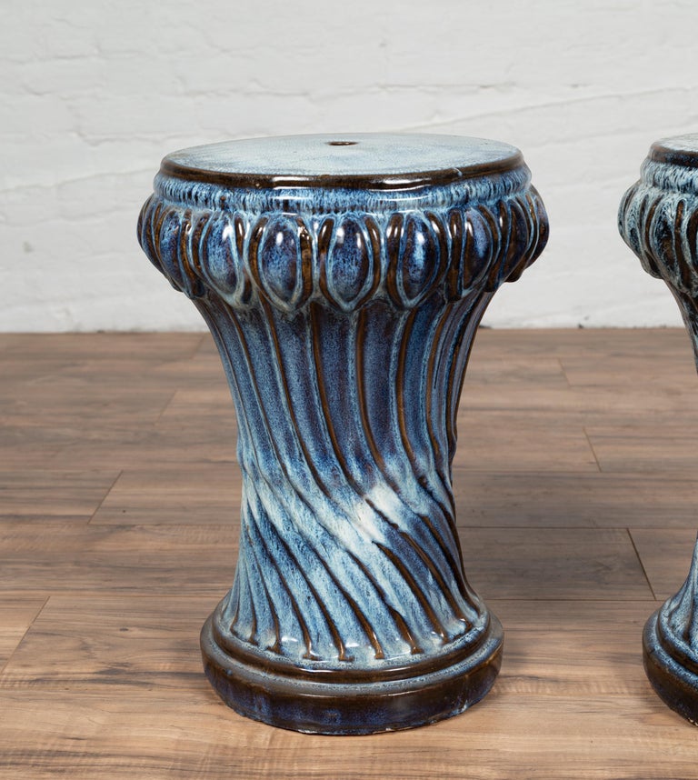 Two Vintage Blue Ceramic Garden Seats with Twisted Fluting, Sold