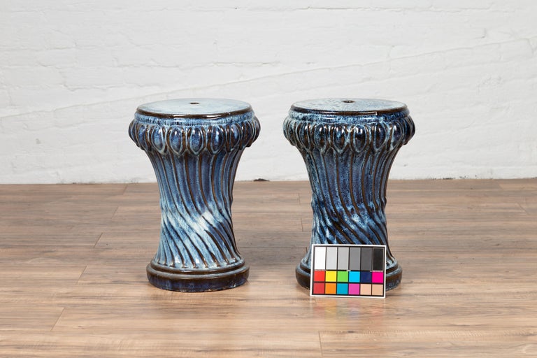 Two Vintage Blue Ceramic Garden Seats with Twisted Fluting, Sold