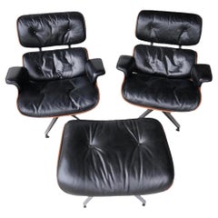 Two Vintage Eames Lounge Chairs with Ottoman by Herman Miller