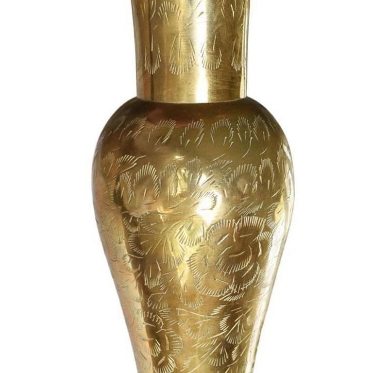 A pair of etched brass vases from India. 

Dimensions:
11.75