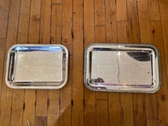 Two vintage George V silver plated trays with gadrooned border and one meat rack