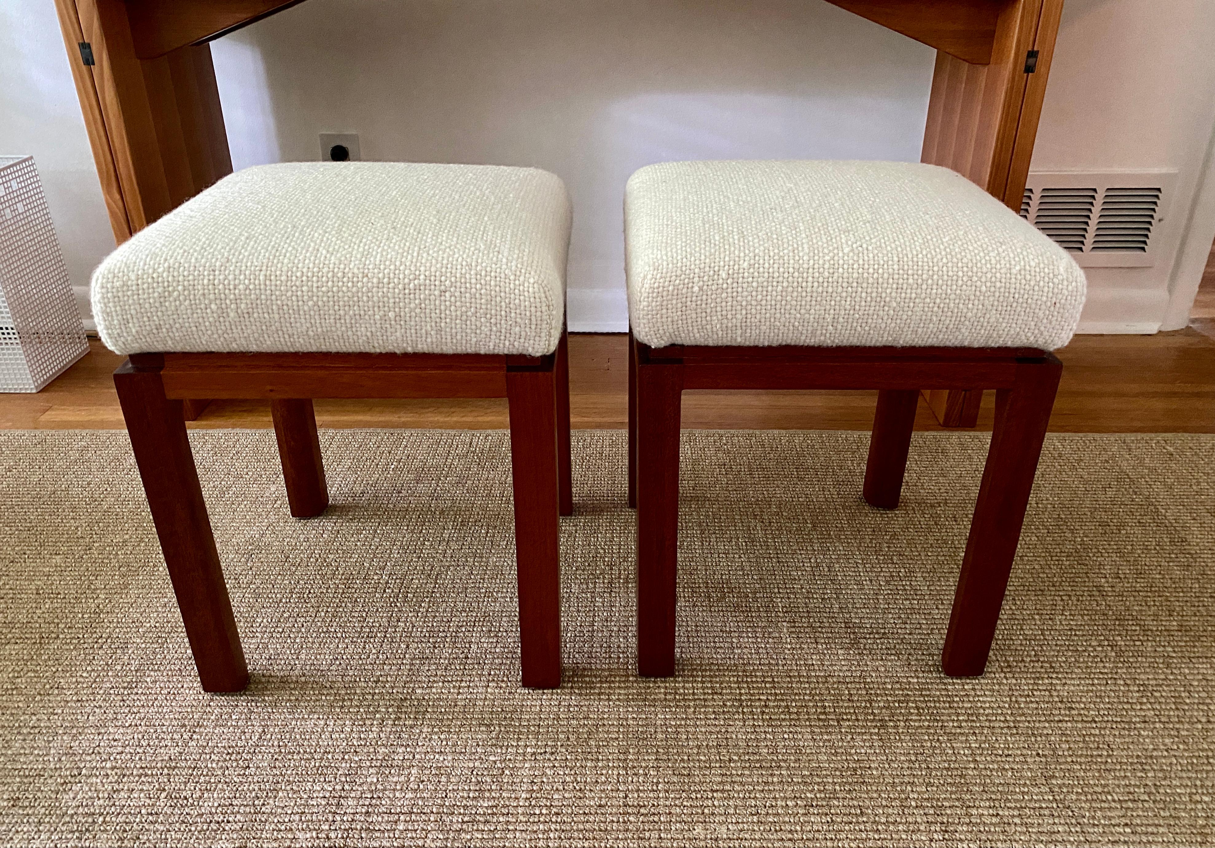 A pair of vintage benches designed by Harvey Probber for his own manufacturing company in 1955, the benches are in his catalog and are model number 929. The benches have been recently reupholstered in a cream 100% wool fabric called “Morocco” by