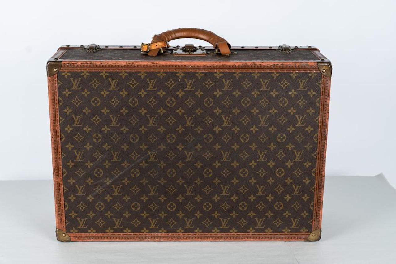 Leather Two Vintage Louis Vuitton Trunks For Sale