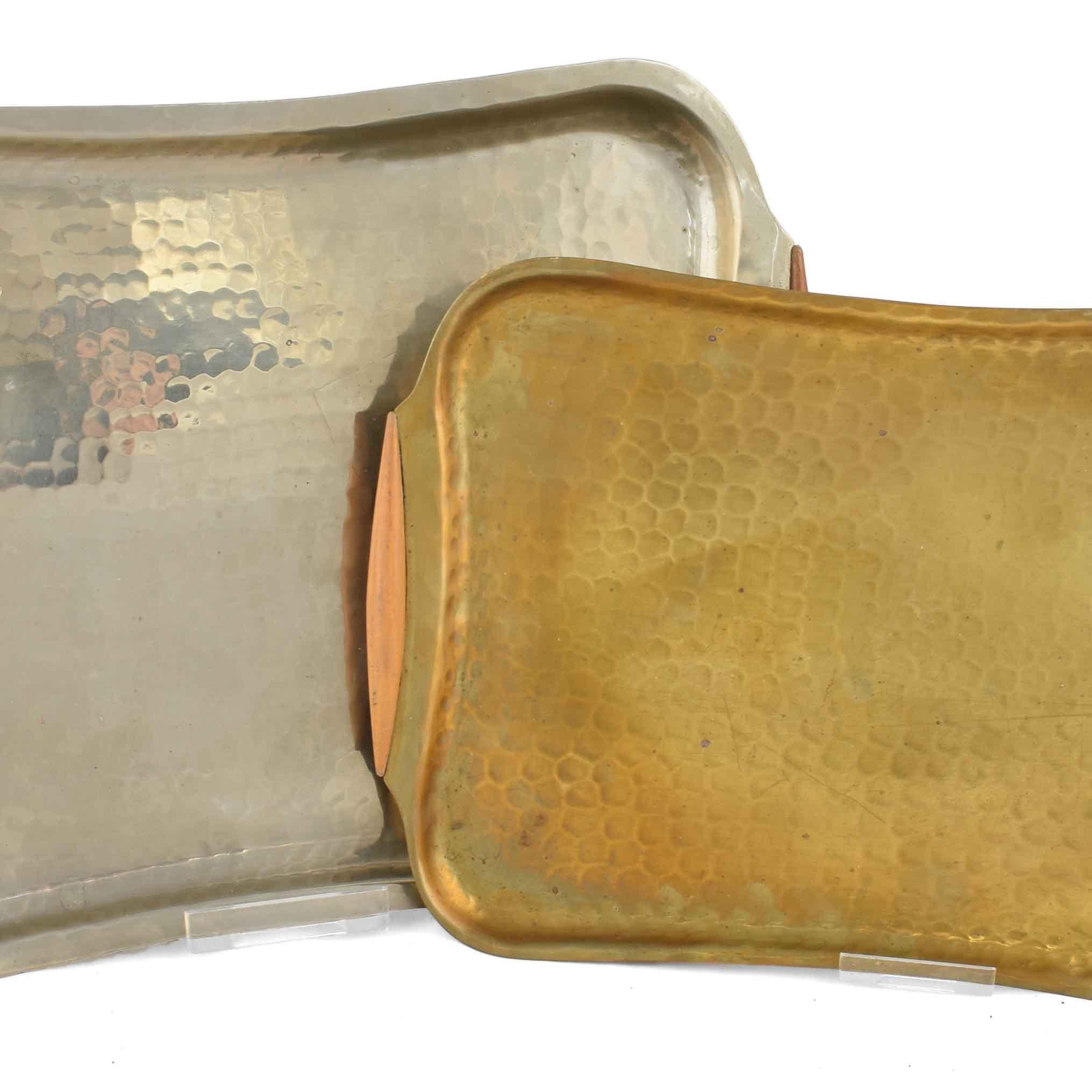 Two trays is an original pair of objects realized by Eugen Zint in the 1950s. 

Original tin and brass. 

The pair includes two similar trays: one brass tray and one tin tray. 

Both the objects are in very good conditions. 

Very beautiful