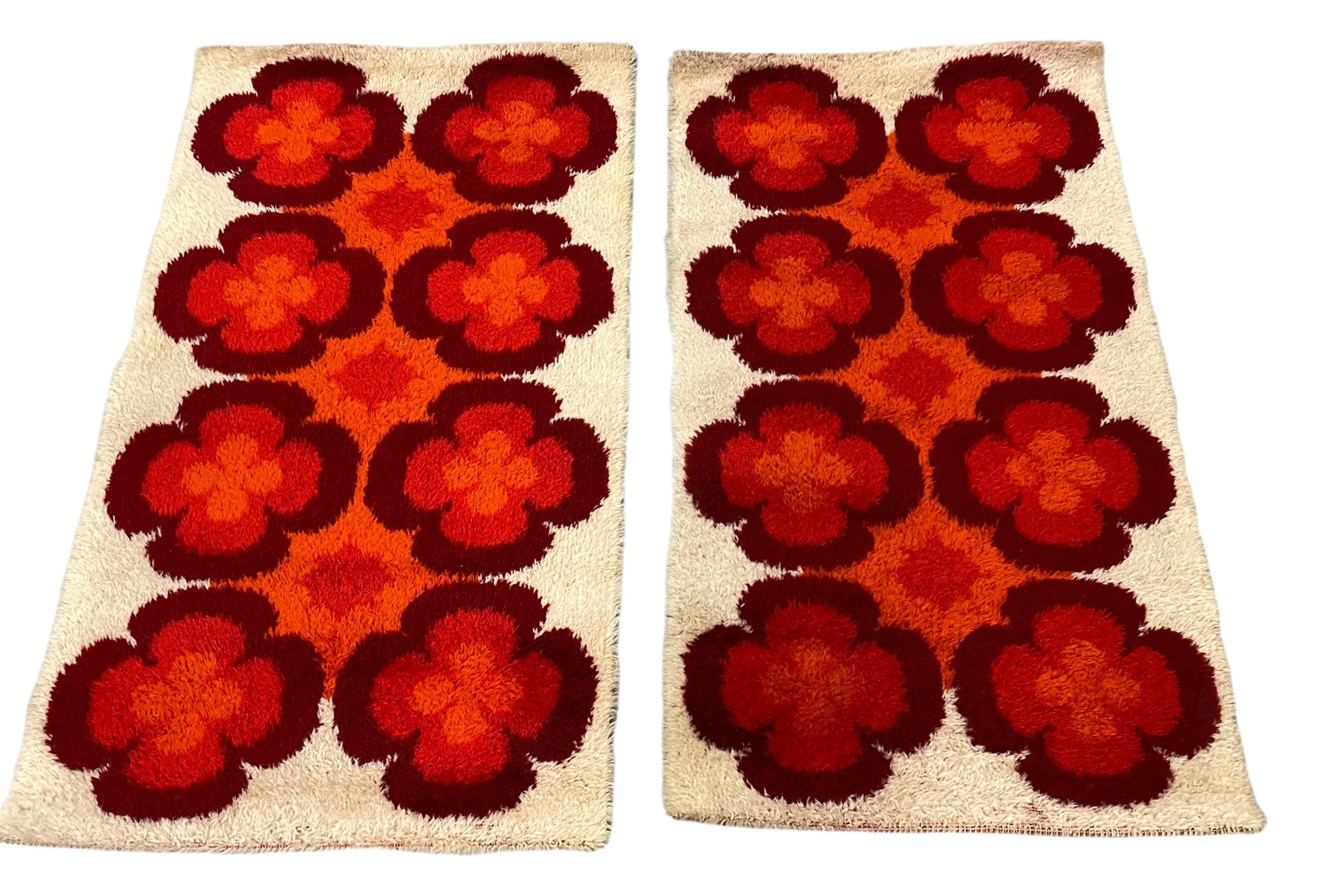 These two rugs are a great example of 1970s pop art interior. Made in high quality weaving technique. These two high quality high pile rugs were designed in the 1970s and manufactured in Germany. Each is made from wool and is still in a good vintage