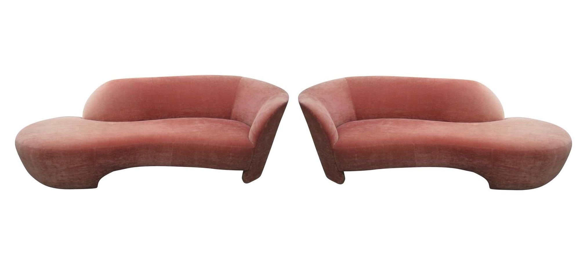 Gorgeous chaise lounge sofas designed by Vladimir Kagan for Weiman Preview. Each modern sculpted one arm sofa features a flowing freeform backrest with unique cutaway style design. Professionally re-upholstered in a sumptuous rose velvet. These are
