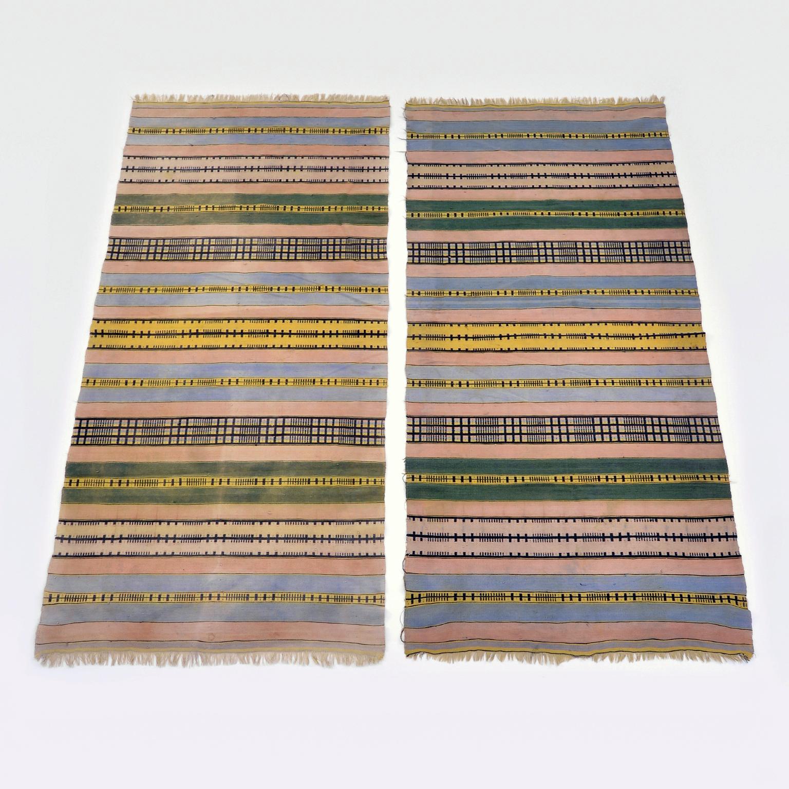 Two flat-wave hand woven cotton wall rugs from the Bauhaus weaving workshop. 