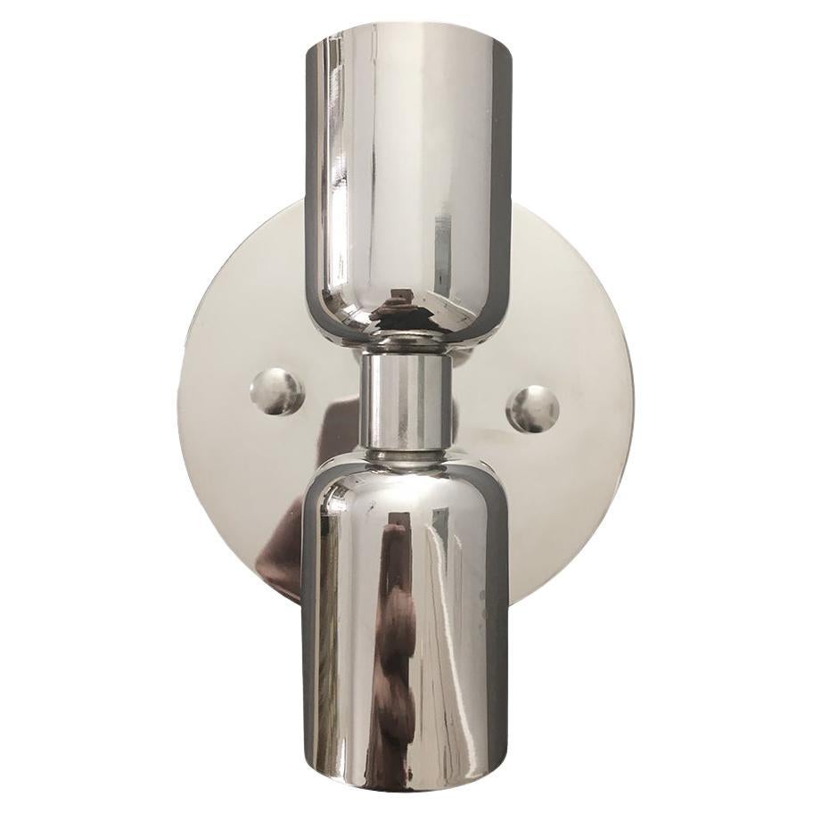 A simple modern sconce to accent your bedroom, bathroom, or work space. This contemporary light also works well in a commercial setting restaurant, retail, or office space.
Designed By Michele Varian
Polished Nickel
Overall product dimensions: 5
