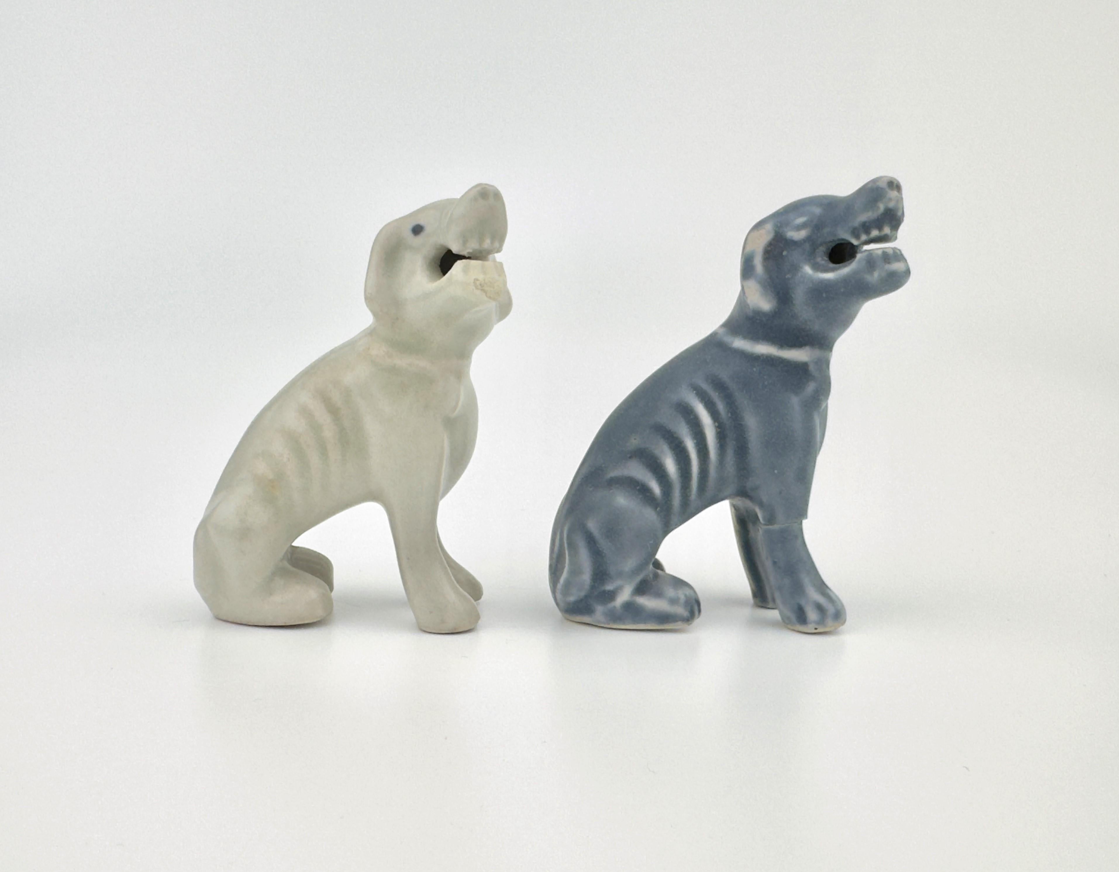 Chinese Two White Figure of Seated Hounds, Circa 1725, Qing Dynasty, Yongzheng reign For Sale