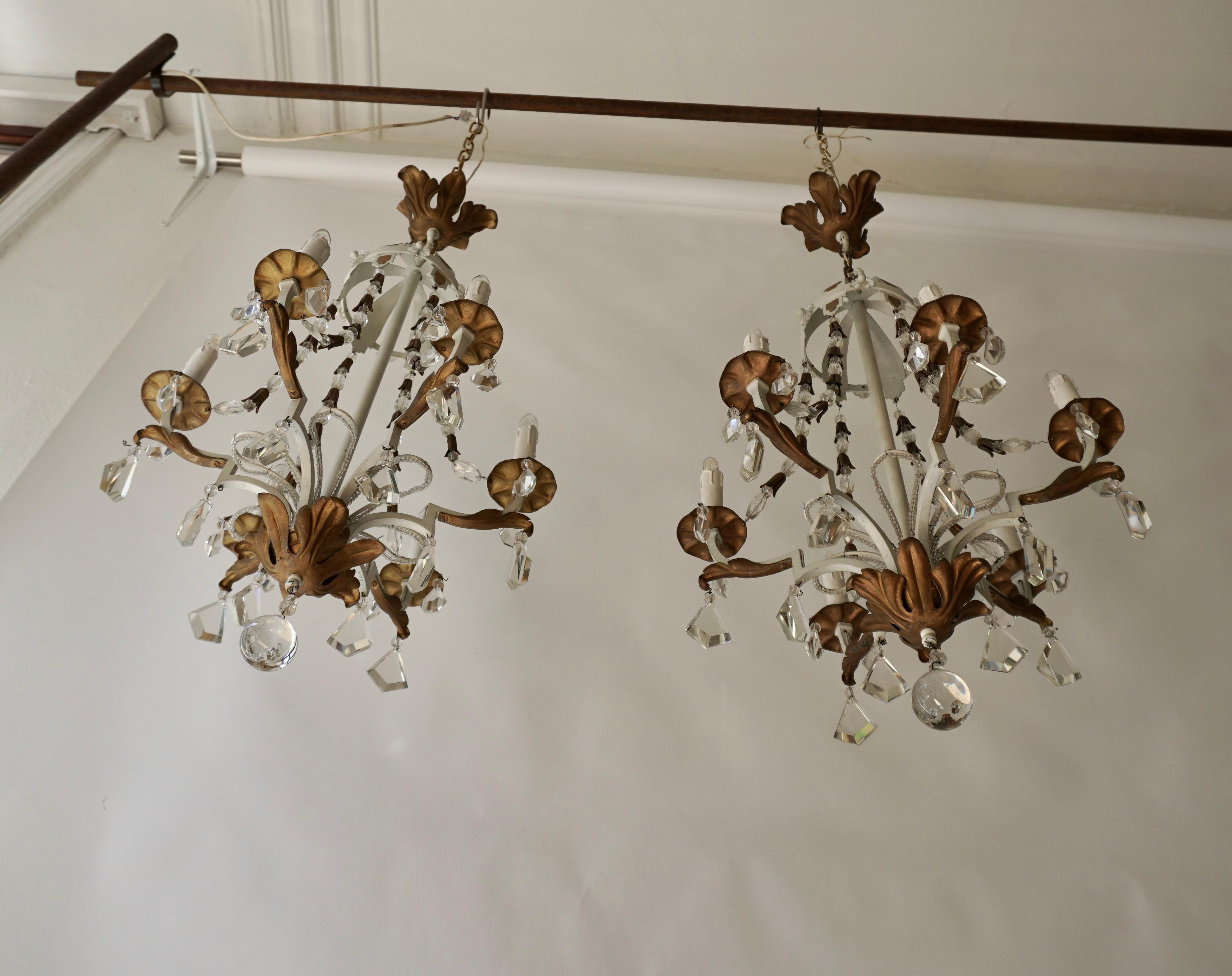 Hollywood Regency Two White Gold Chandeliers Decorated with Crystal For Sale