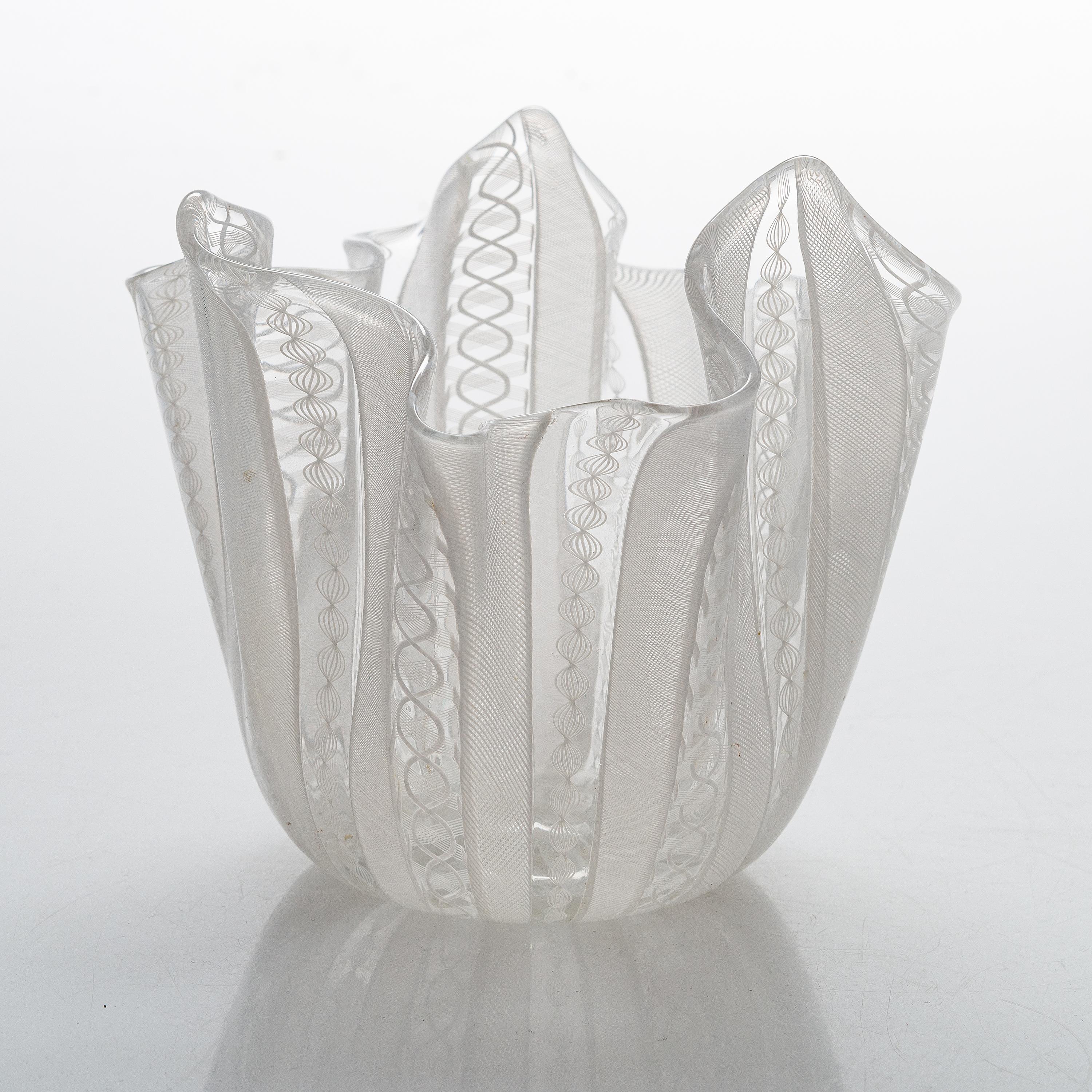 Two white handkerchief vases/bowls, featuring zanfirico filigree glass from Venini, Murano. These Venetian glass vases/bowls showcase delicate stripes of white zanfirico lattice filigree. While the origin of the other manufacturer remains unknown,