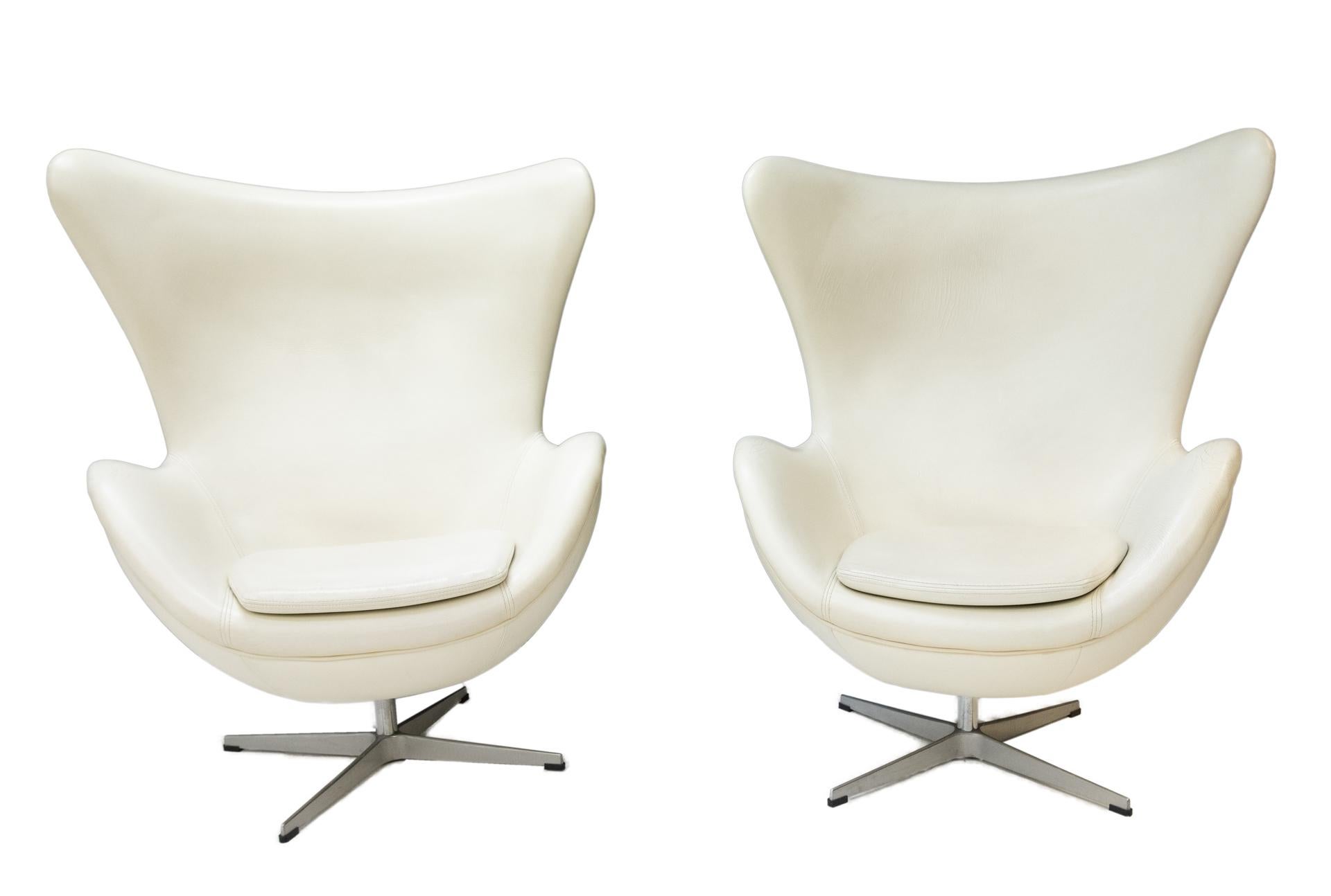 Italian Two White Leather Egg Chairs and Footstool