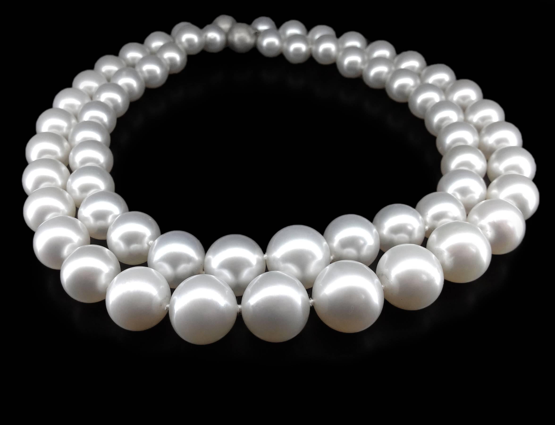 Iridescent white South Sea pearls positively glow on these beautiful necklaces. Decadently beautiful and desirable on any skin tone.

29 graduated 10.5 – 14.7 millimeter, 15