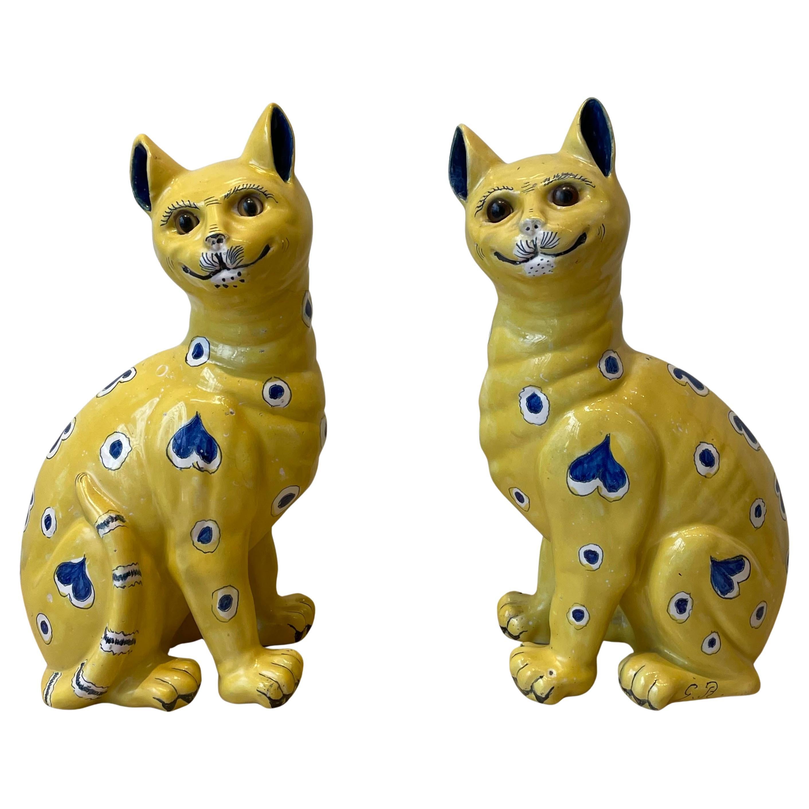 Two yellow ceramic cats, Emile Gallé (1846-1904)
