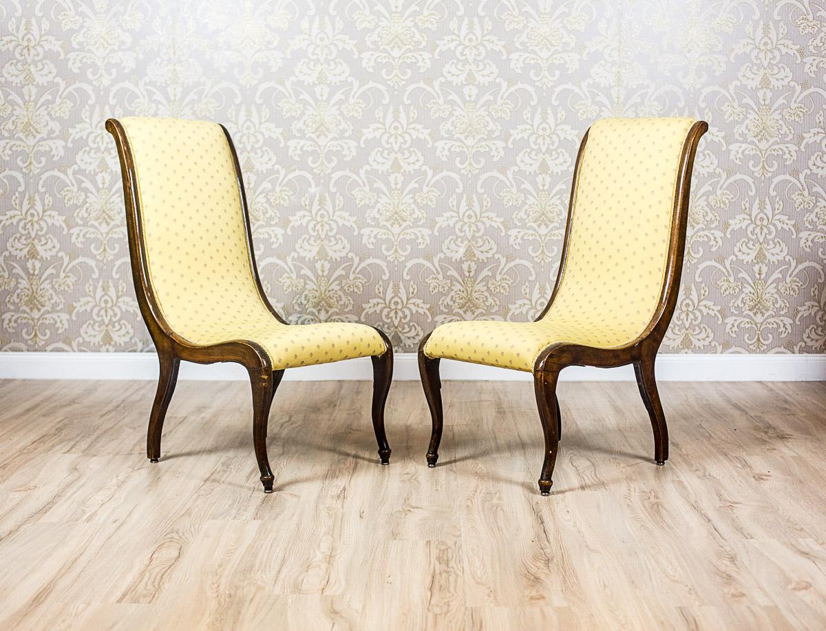 We present you these armchairs from the end of the 19th century with wooden sides and upholstered centers.
Simple design with slightly tilted backrest give the armchairs
a timeless and modern look.

Although presented armchairs are not