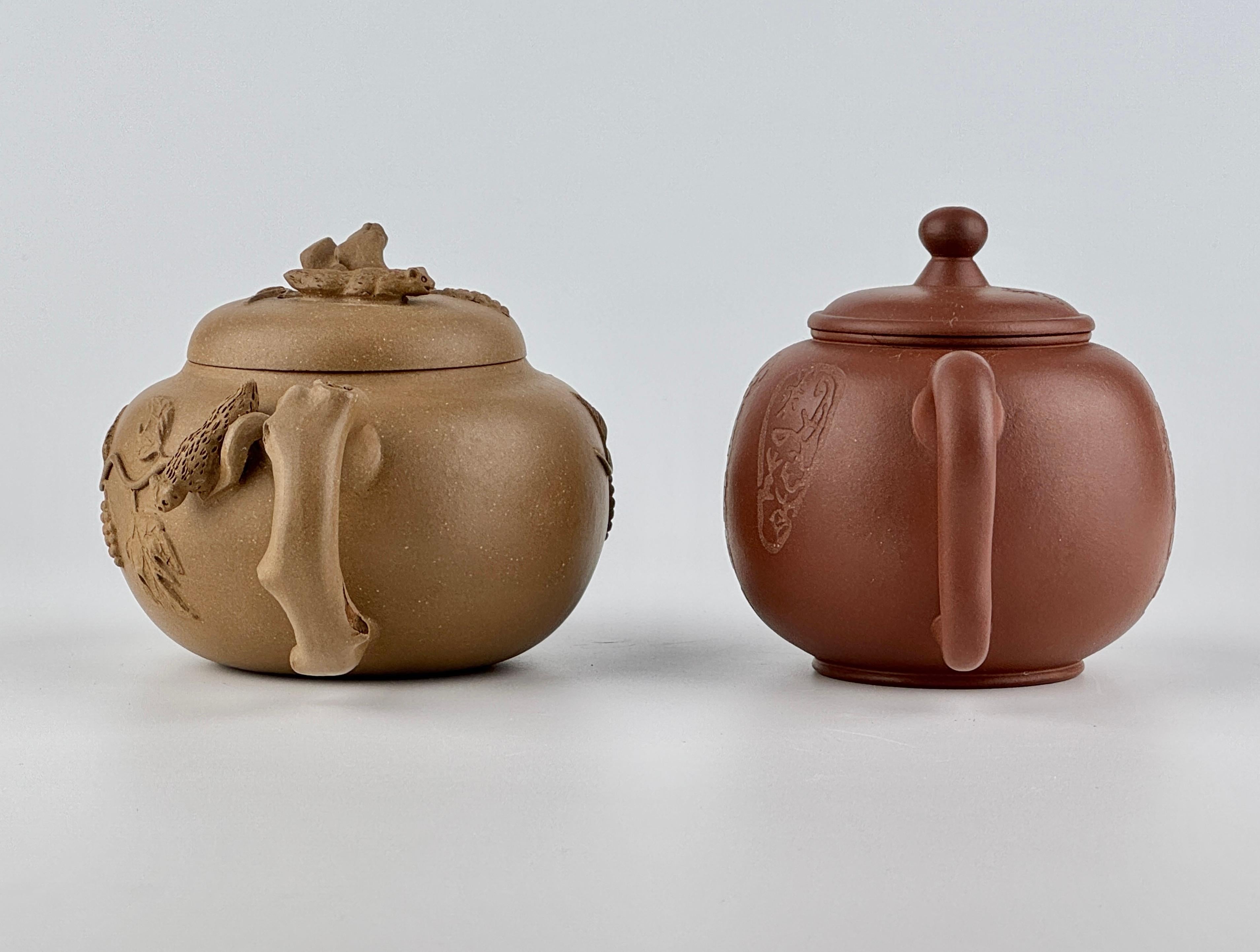 Both Yixing Zisha teapots appear to be modern-Republic era pieces. Yixing Zisha teapots are made from rare Zisha (紫砂) clay, which is exclusively mined in Yixing, China. This unique clay is highly porous, allowing it to absorb and enhance the aroma