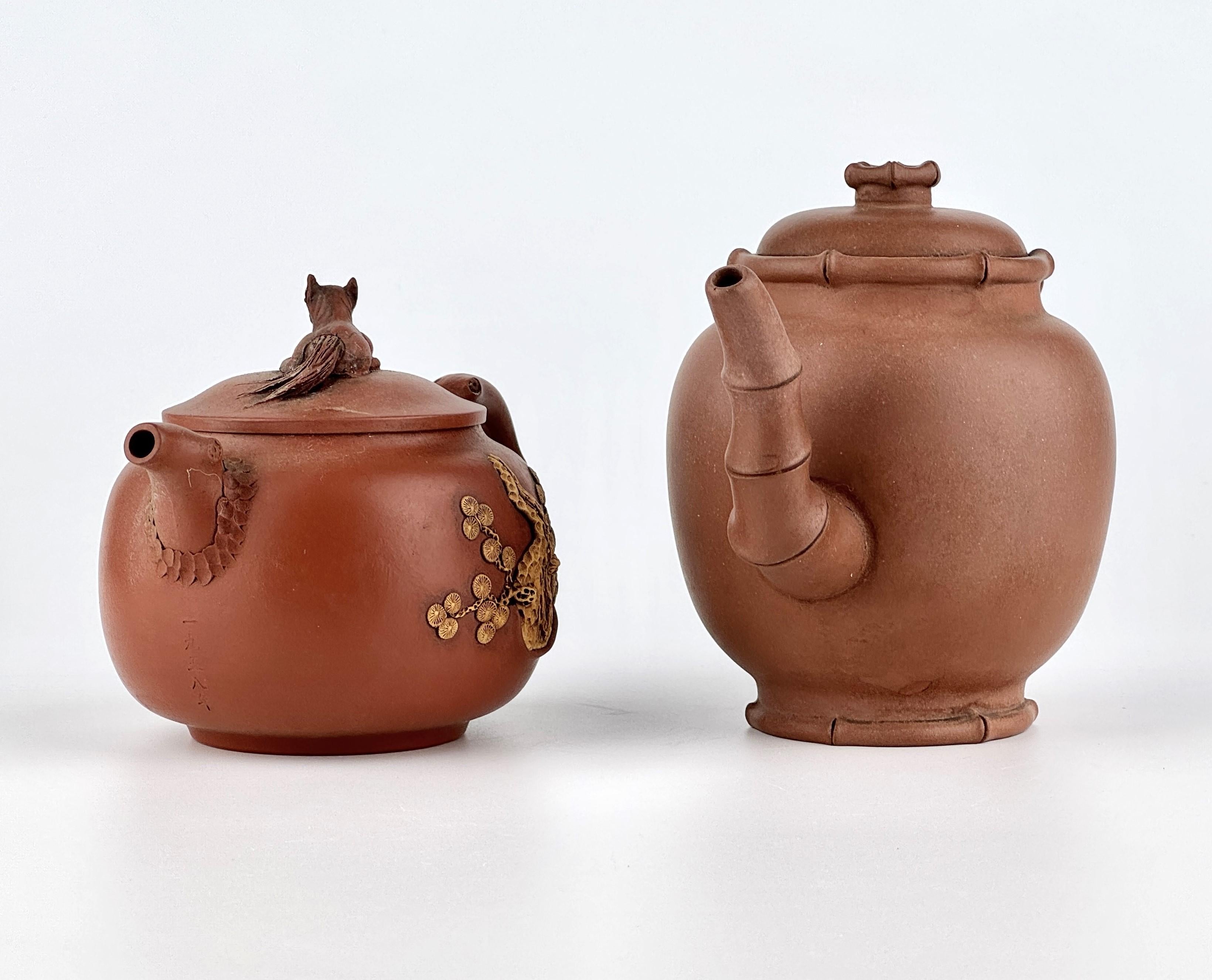 Both Yixing Zisha teapots appear to be modern to republic-era pieces. Yixing Zisha teapots are made from rare Zisha (紫砂) clay, which is exclusively mined in Yixing, China. This unique clay is highly porous, allowing it to absorb and enhance the