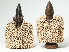 Two Yoruba Tribe twin Figures with Cowrie Cloaks, Nigeria