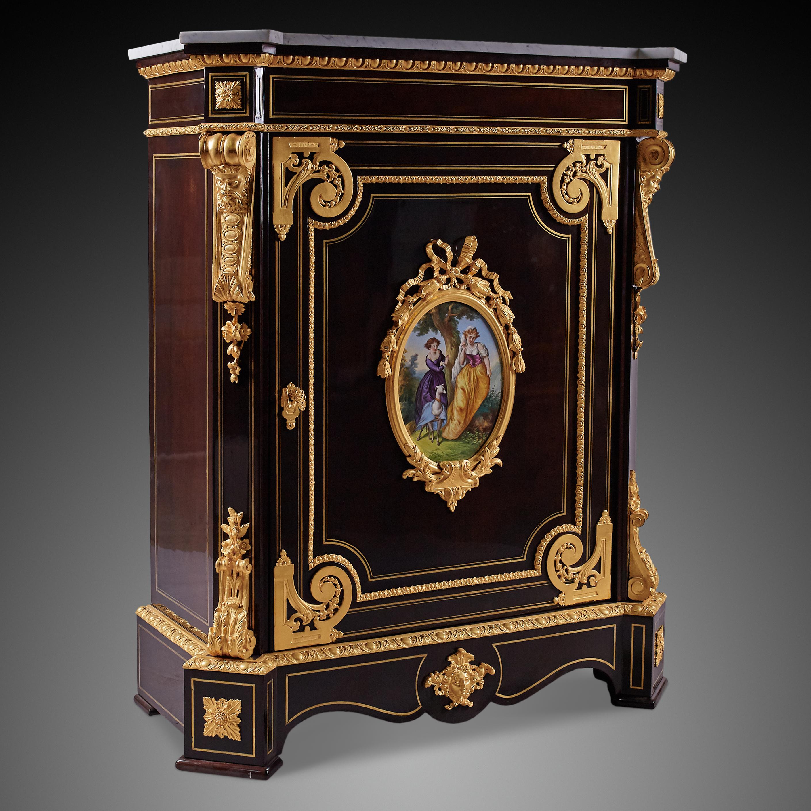 The cabinet is crafted in Napoleon III style, which is also known as Second empire style. The main material of the cabinet is ebony with dark varnish finish. The top of the cabinet iscovered with  Carrara marble, which was a popular combination of