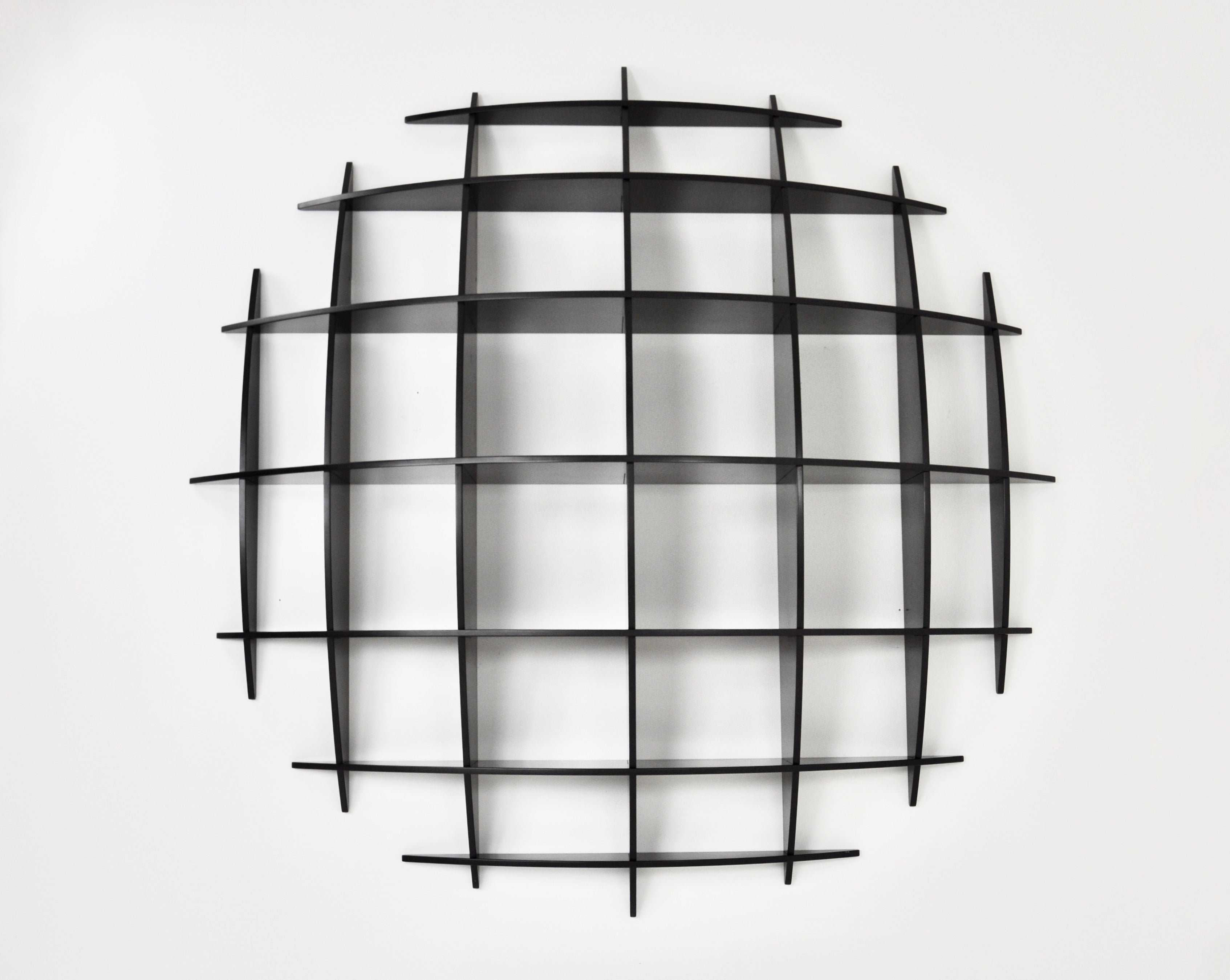 Black wooden wall unit by Manfredo Massironi. Wear due to time and the age of the wall unit.
For shipping, request us for receive the best price.