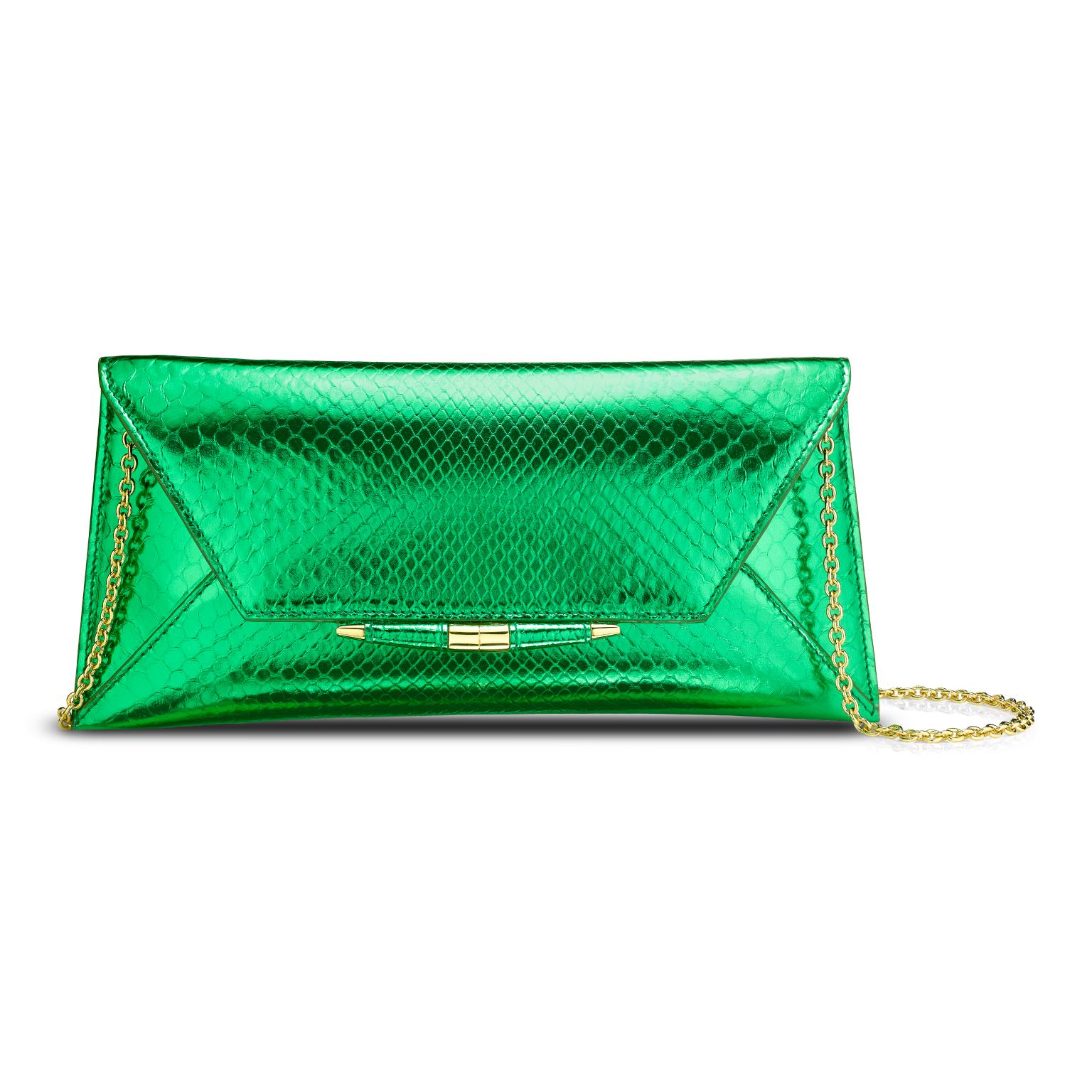 The Aimee Clutch large is featured in our Kryptonite Python with gold hardware. The clutch is designed with a three-quarter front flap, a magnetic snap closure and is finished with our custom Infinity Bar. It fits the large iPhone, has a hidden
