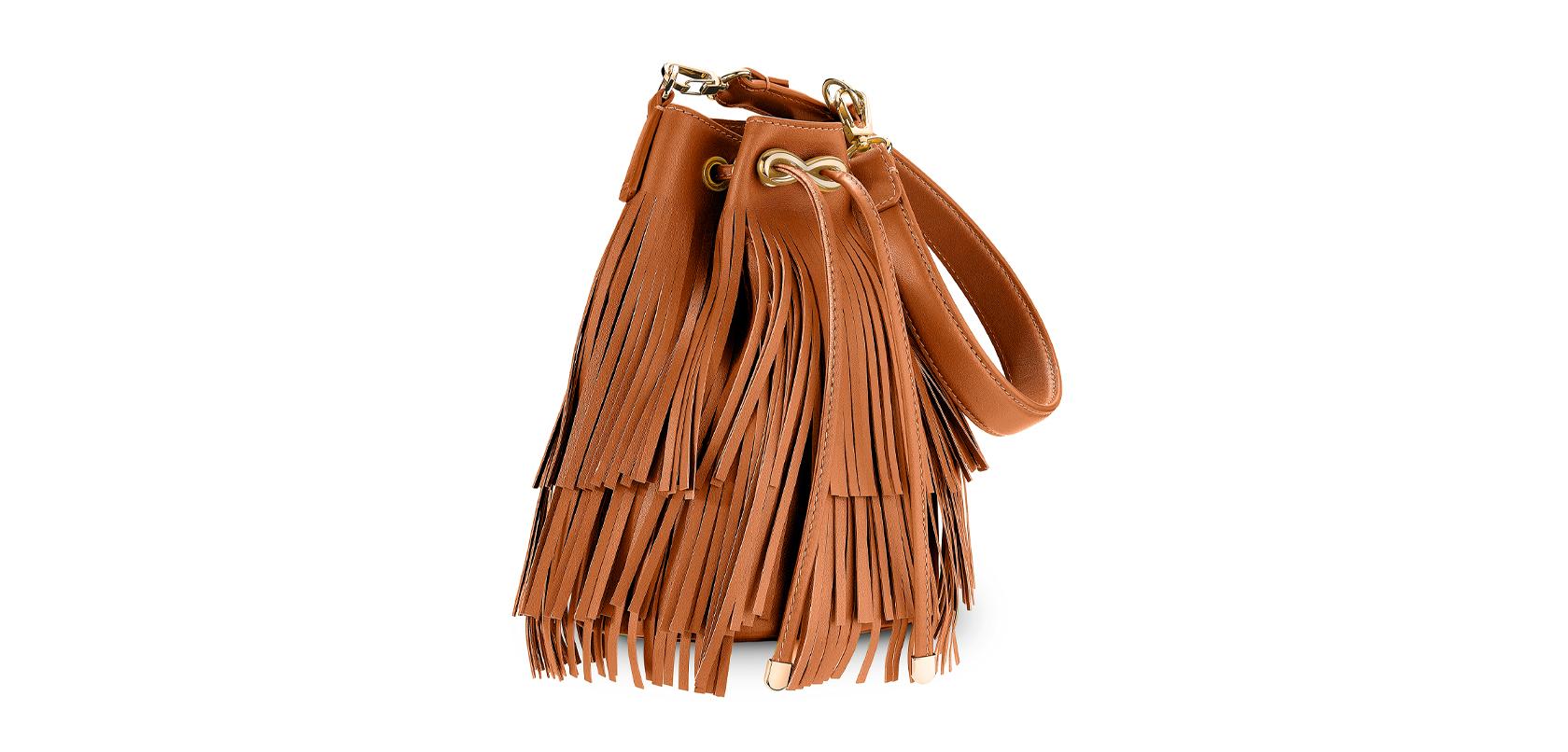 The Grace bucket is featured in cognac leather fringe with gold hardware and a detachable leather handle. It has a drawstring pull finished with our custom Continuum Closure. It fits the large iPhone, has internal card slots, and features our