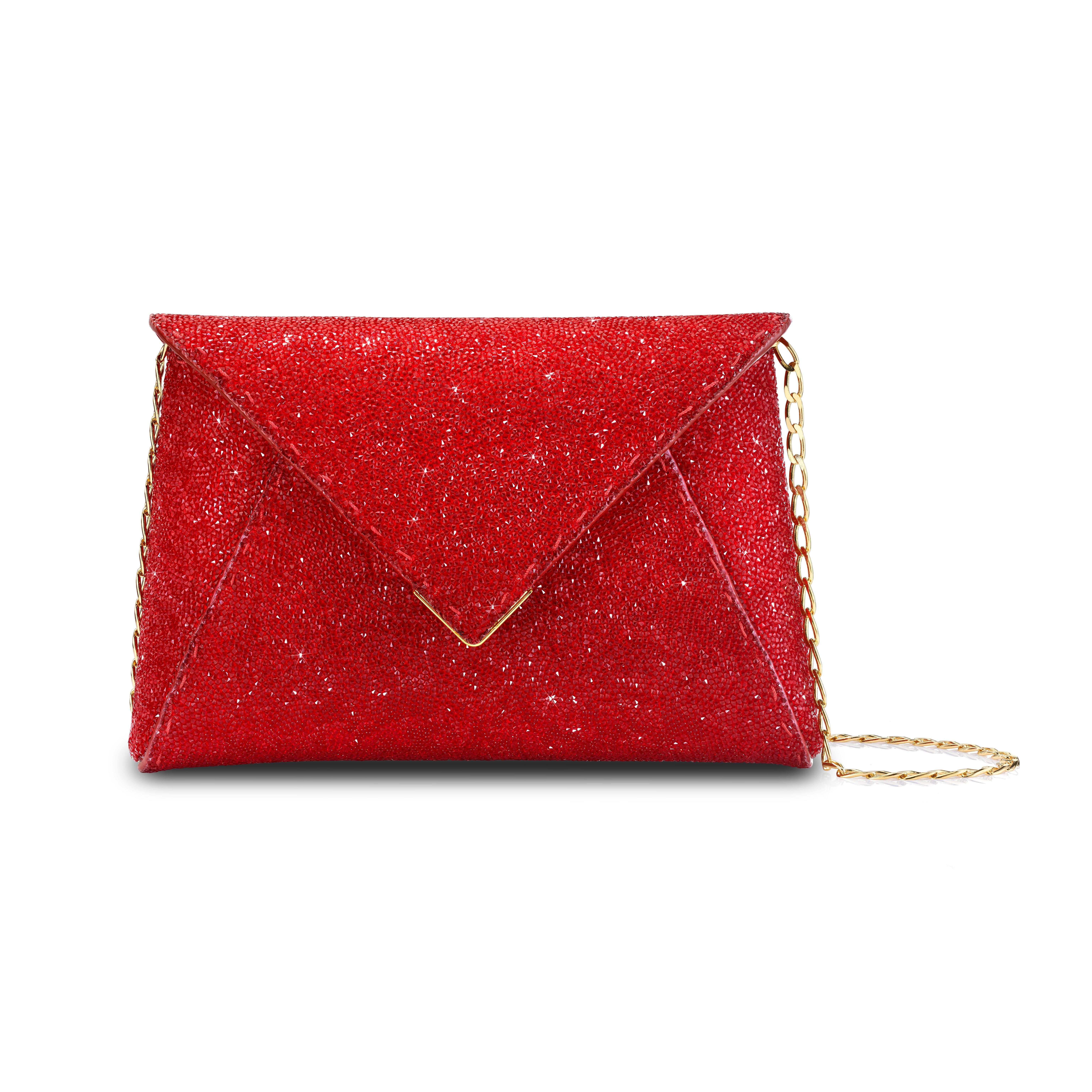 The Lee Pouchet Small Clutch is featured in our Scarlet Red Swarovski rock crystal and gold hardware. The envelope-shaped clutch has a triangular front flap and a magnetic snap closure. The exterior detailing is entirely hand-stitched. The bag is