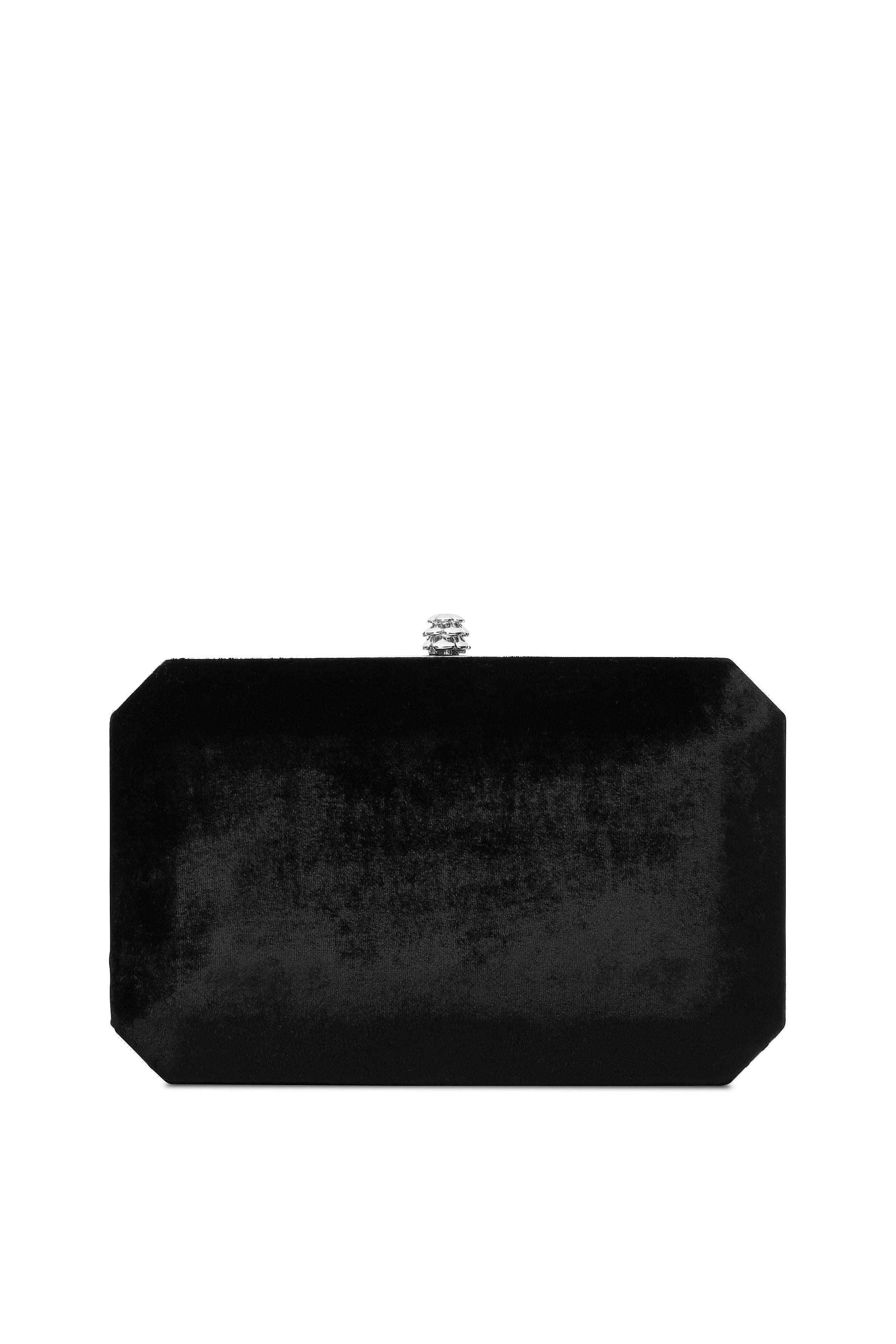 The Lily is featured in our Black Onyx crushed velvet with silver hardware. It is a hard-framed rectangular clutch designed with interior pockets and an optional silver cross-body chain. It fits the large iPhone and features our signature Pinecone
