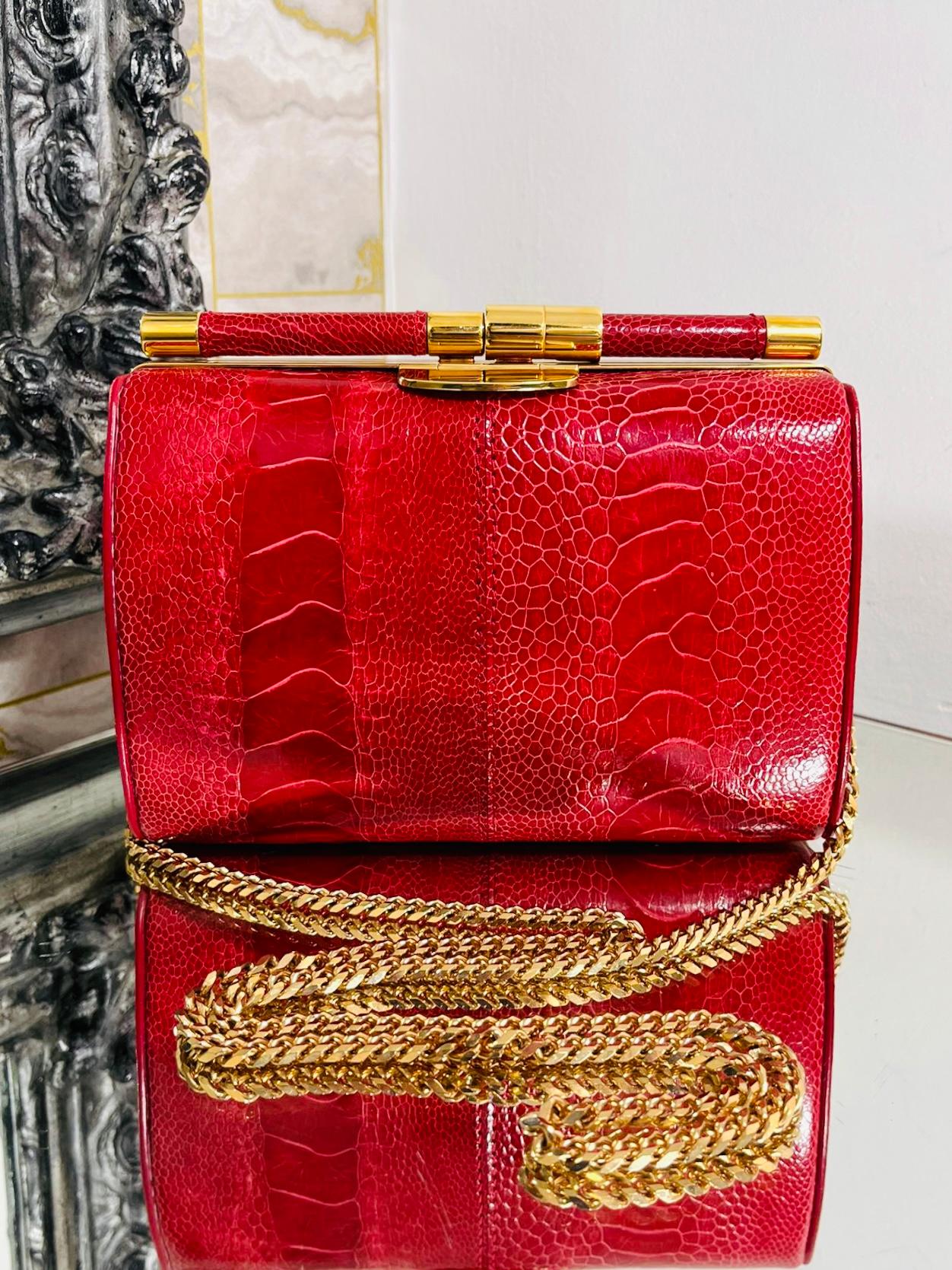 Tyler Ellis Ostrich Skin Clutch Bag With Chain Strap

In red exotic skin and gold hardware, Anjuli evening bag.

Structed oval bag with removable crossbody chain strap.

Rrp £3,500.

Size - Height 14cm, Width 18cm, Depth 7cm

Condition - Very Good