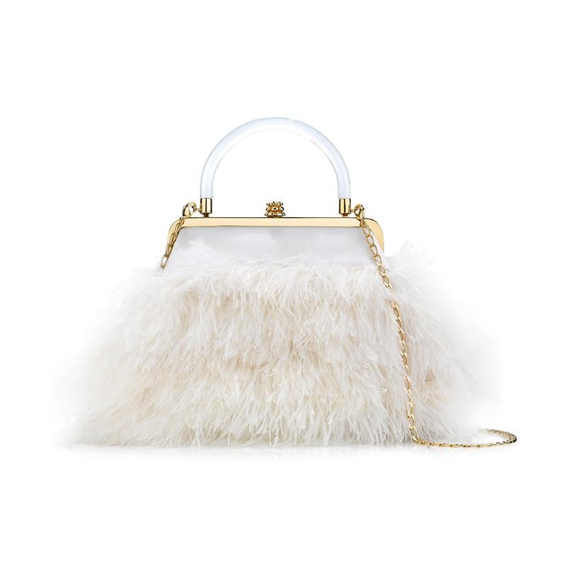 The Poppy is featured in Cloudy White Ostrich Feathers and Wedding White Satin. This soft pouch is designed with our custom half-metal frame and Pinecone Closure. It fits the large iPhone, has an optional gold chain, a Lucite top handle and features