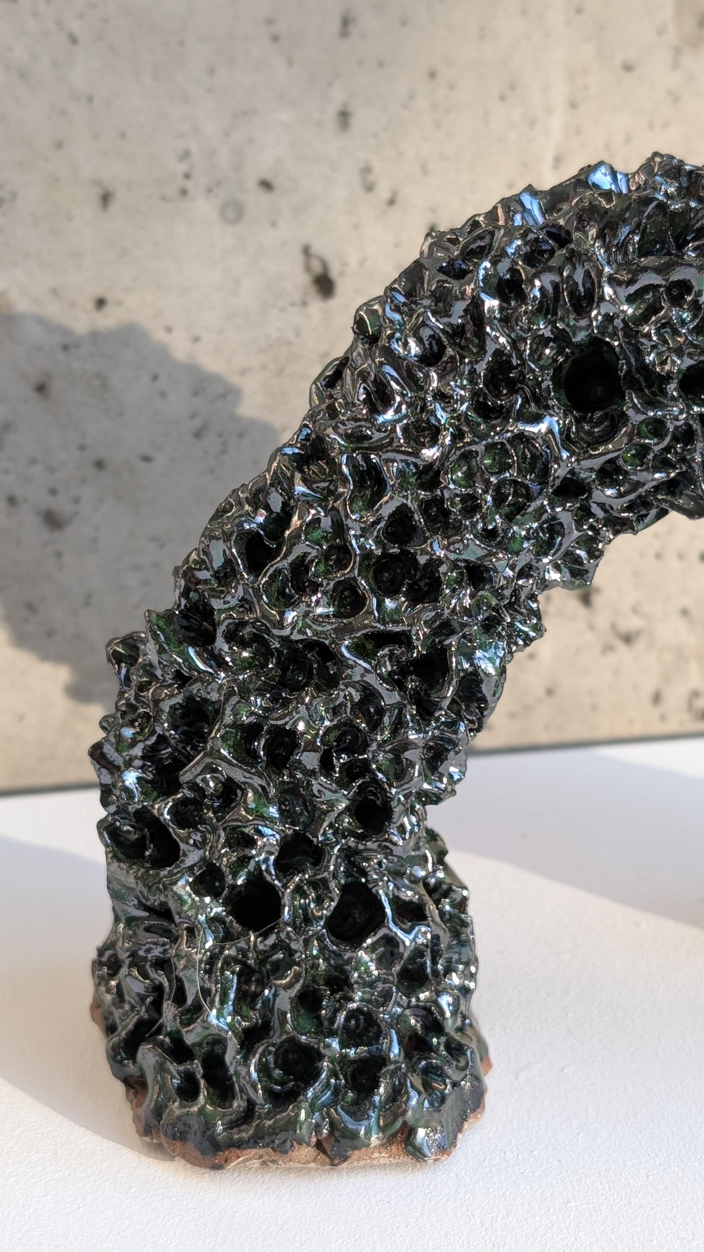 Tyler James Goin is a Vancouver-based sculptor whose work bridges the industrial and the organic through clay and metal. With a background as a millwright machinist and a decade-long apprenticeship with sculptor Tony Bloom, Goin brings technical