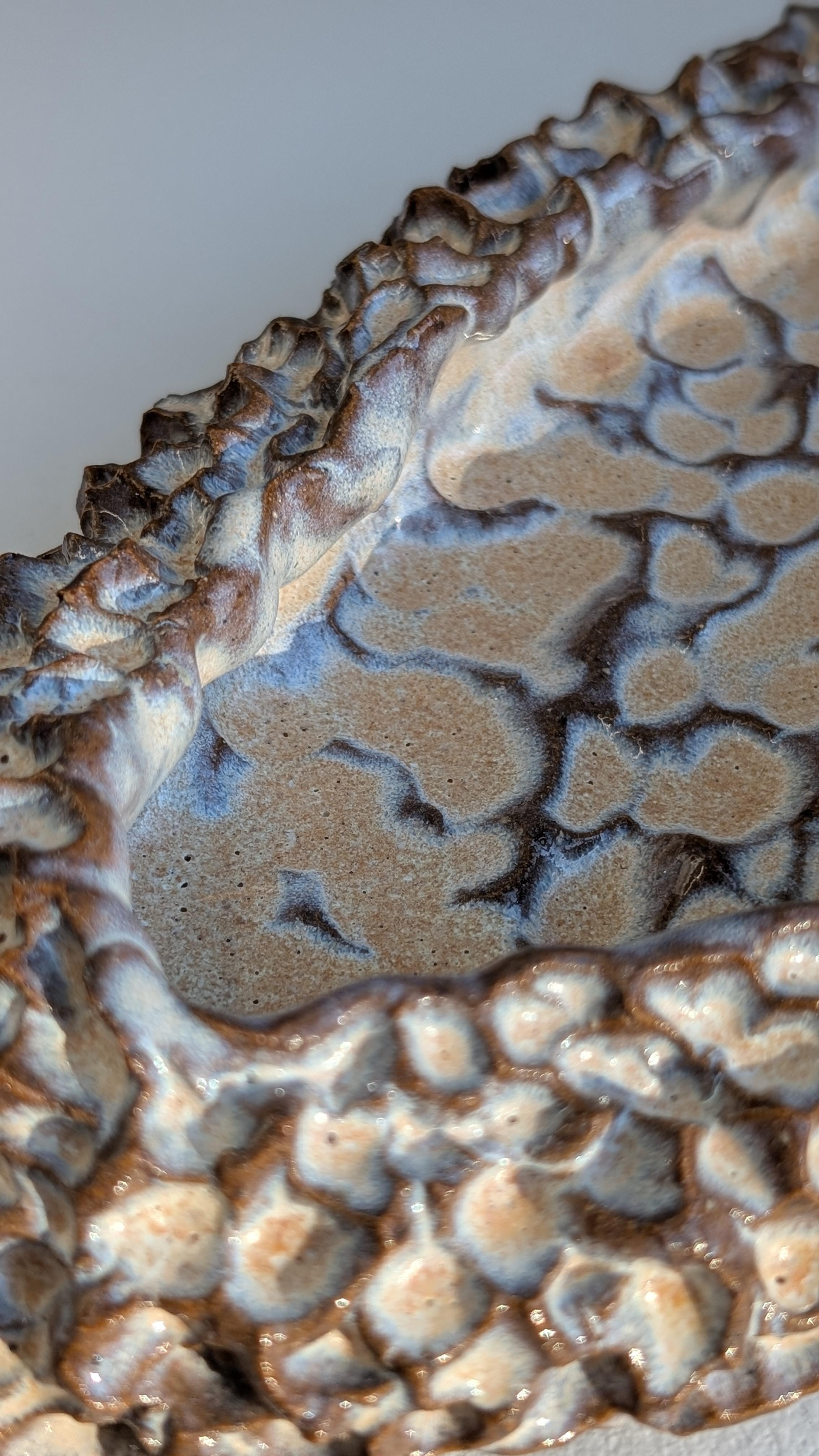 Tyler James Goin is a Vancouver-based sculptor whose work bridges the industrial and the organic through clay and metal. With a background as a millwright machinist and a decade-long apprenticeship with sculptor Tony Bloom, Goin brings technical