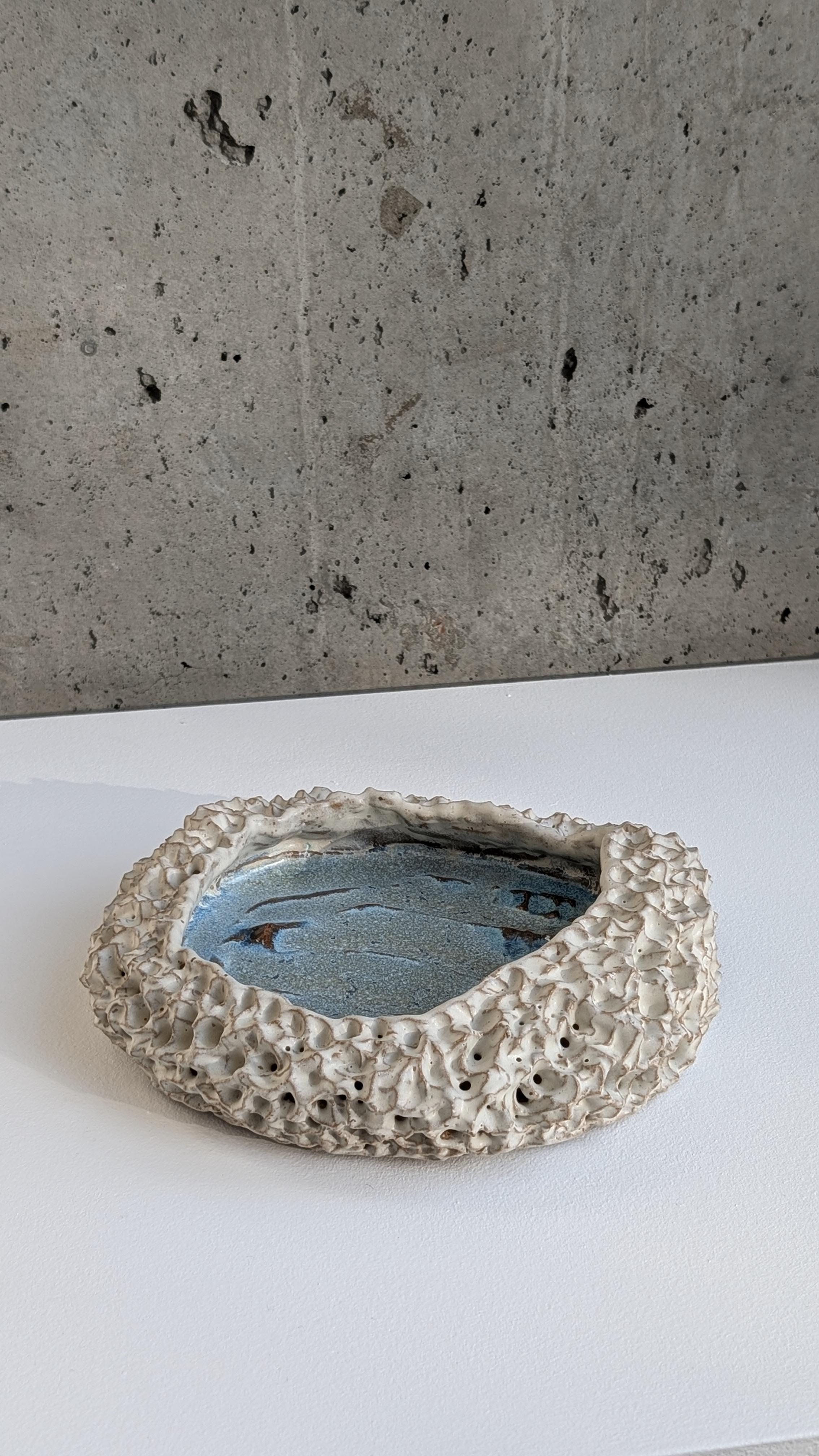 Tyler James Goin is a Vancouver-based sculptor whose work bridges the industrial and the organic through clay and metal. With a background as a millwright machinist and a decade-long apprenticeship with sculptor Tony Bloom, Goin brings technical