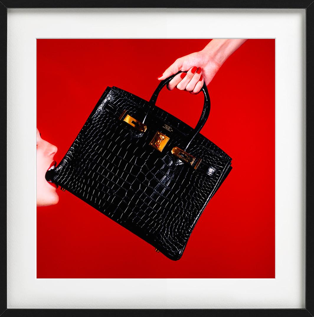 Schwarze Birkin-Handtasche mit rotem Hintergrund, Kunstfotografie, 2021 (Zeitgenössisch), Photograph, von Tyler Shields