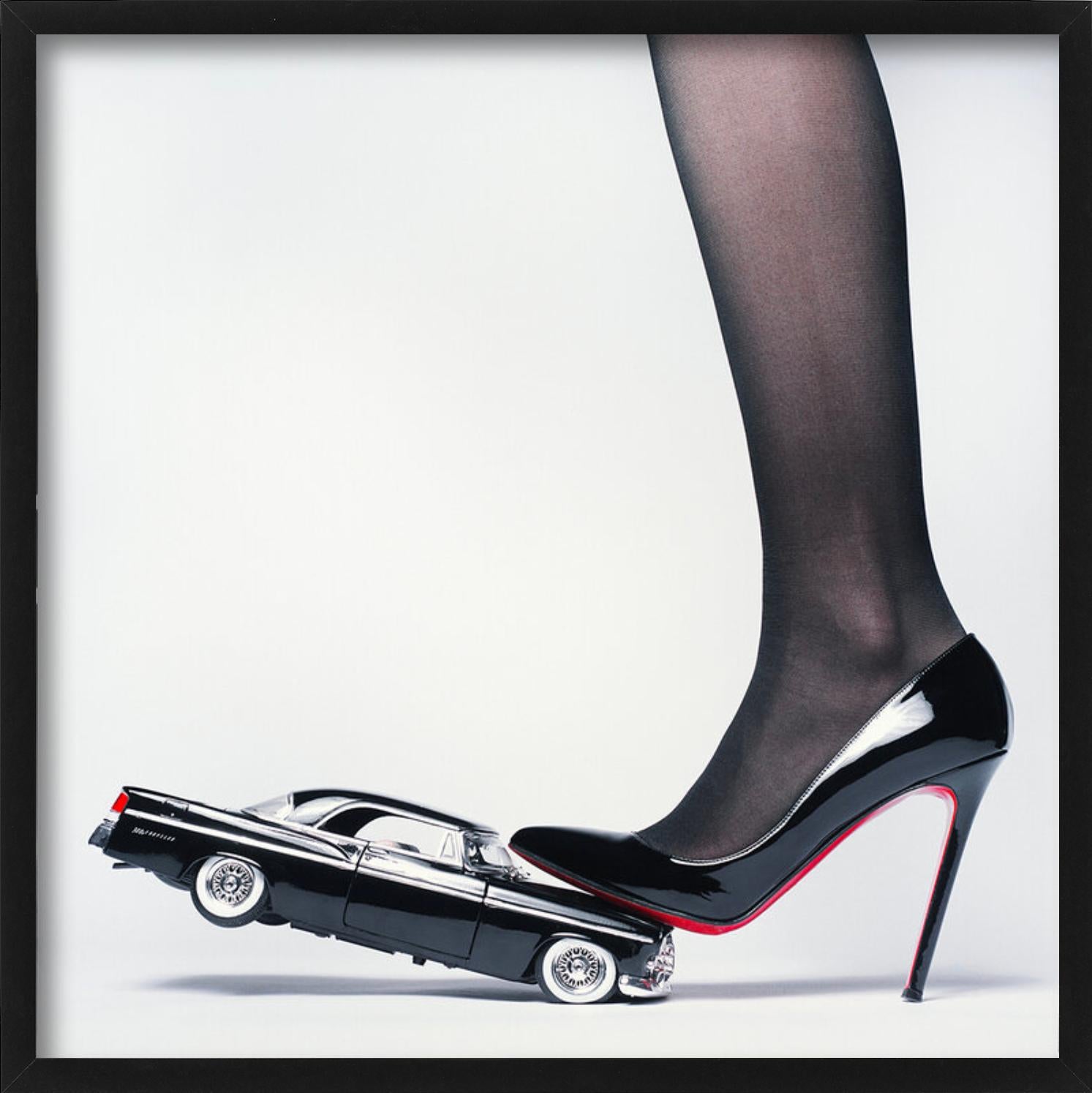 Chrysler Heel - Heel crushing a Car, Fine Art Photography For Sale 1
