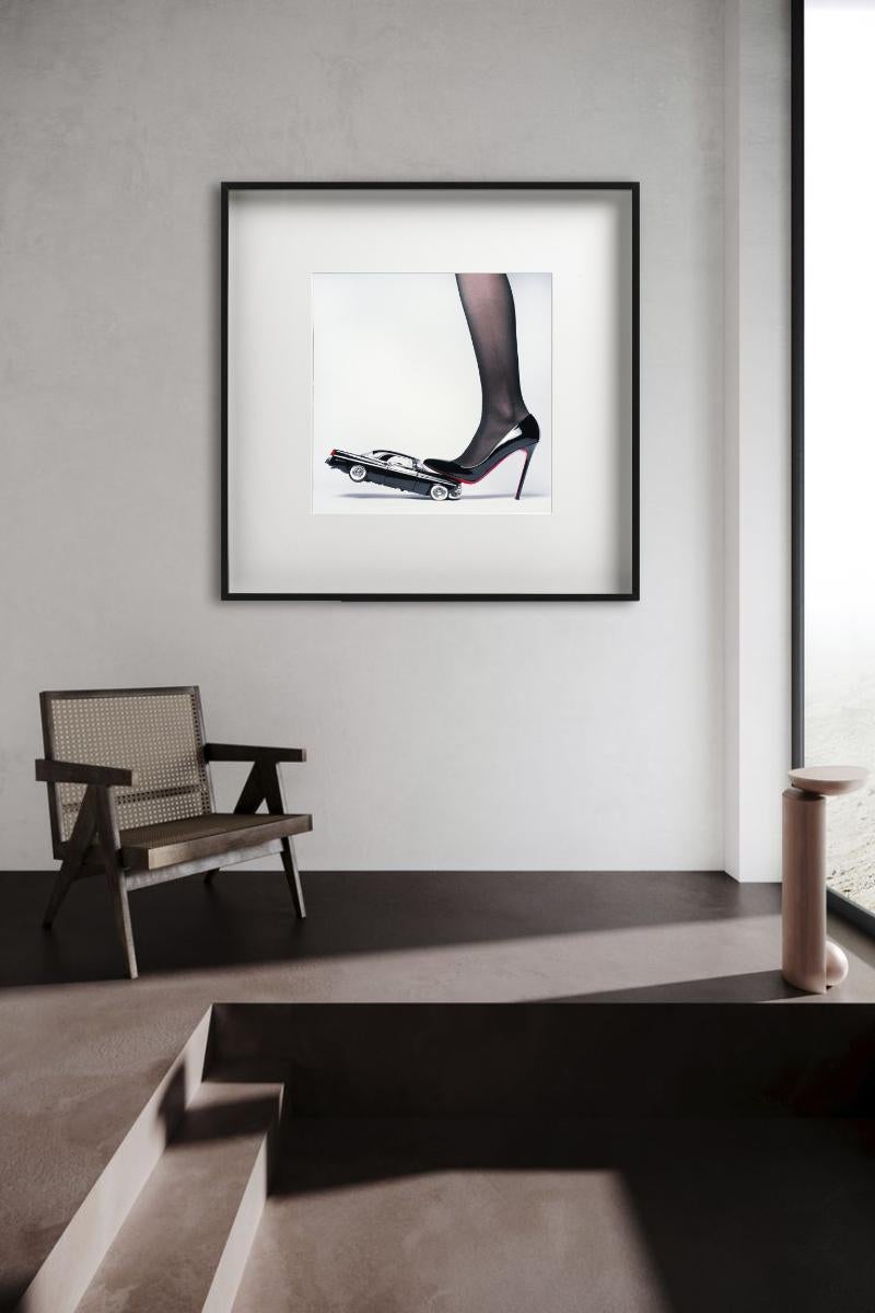 Chrysler Heel - Heel crushing a Car, Fine Art Photography For Sale 2