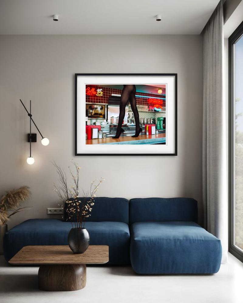 Diner High Heels - Woman Walking on a Counter, Fine Art Photography, 2025 - Black Figurative Photograph by Tyler Shields