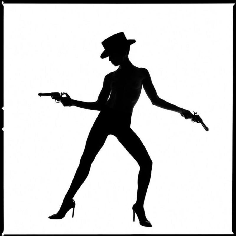 Tyler Shields Figurative Photograph - Gunslinger Silhouette (60" x 60")