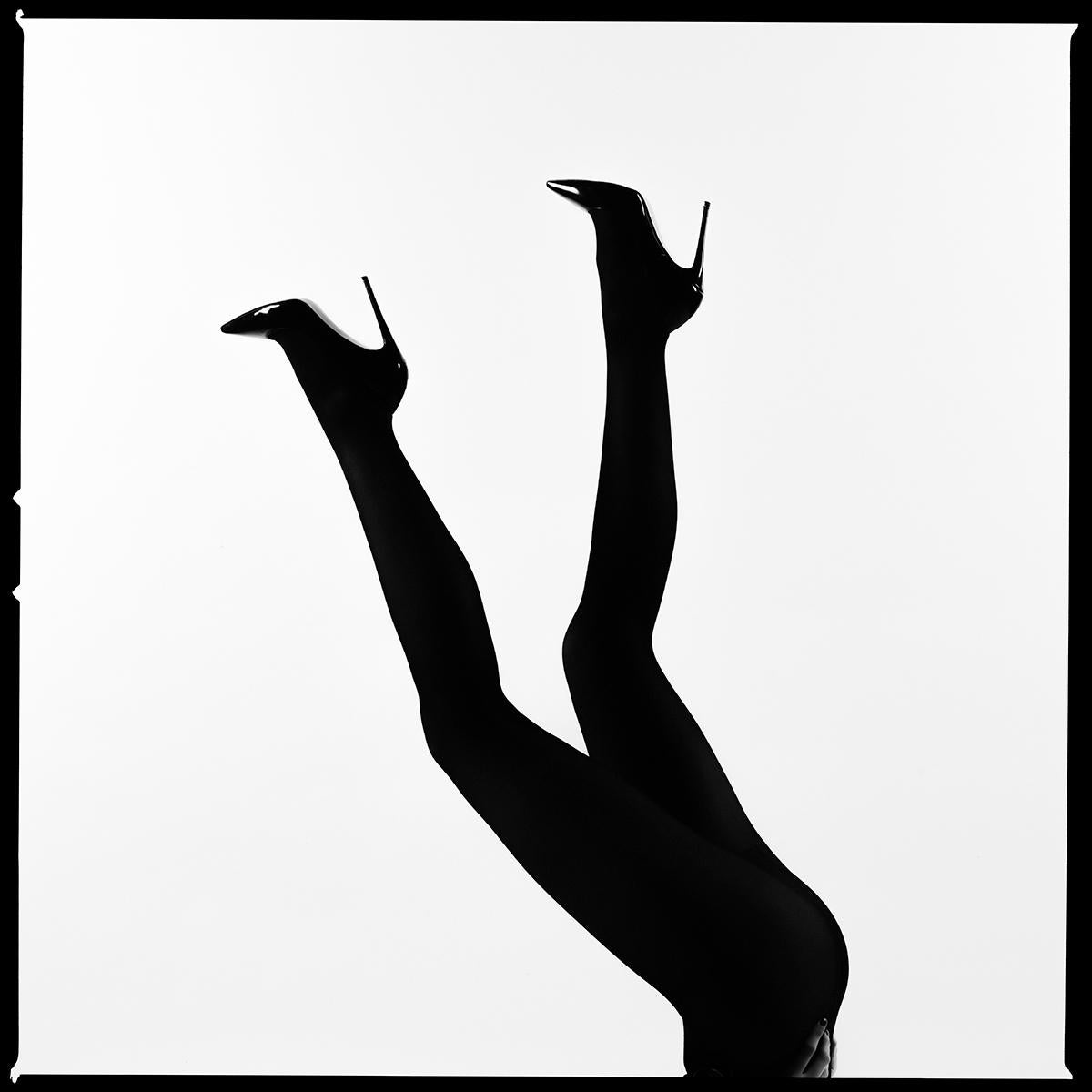 Tyler Shields Black and White Photograph - Legs Up Silhouette (45" x 45")