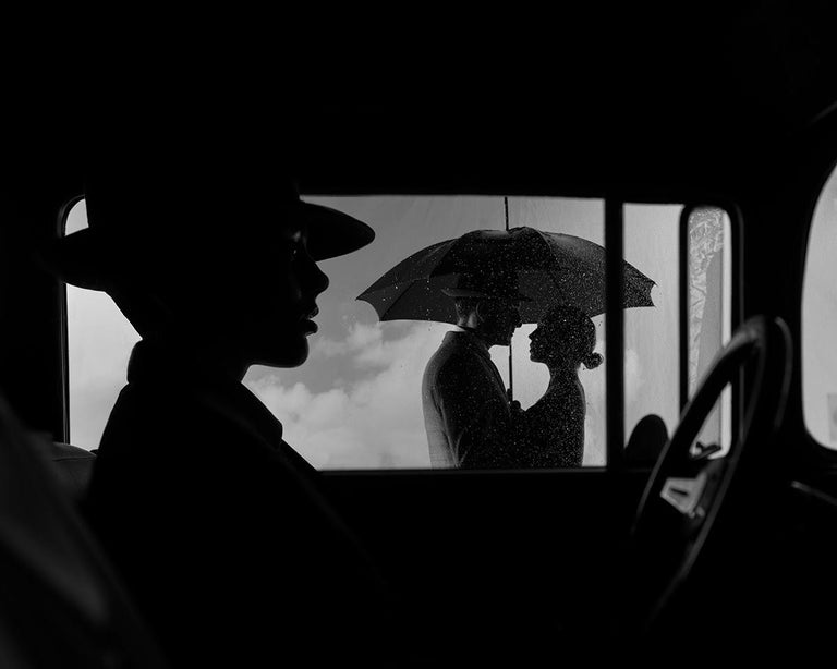 Tyler Shields Portrait Photograph - The Couple Out The Window (56" x 72")