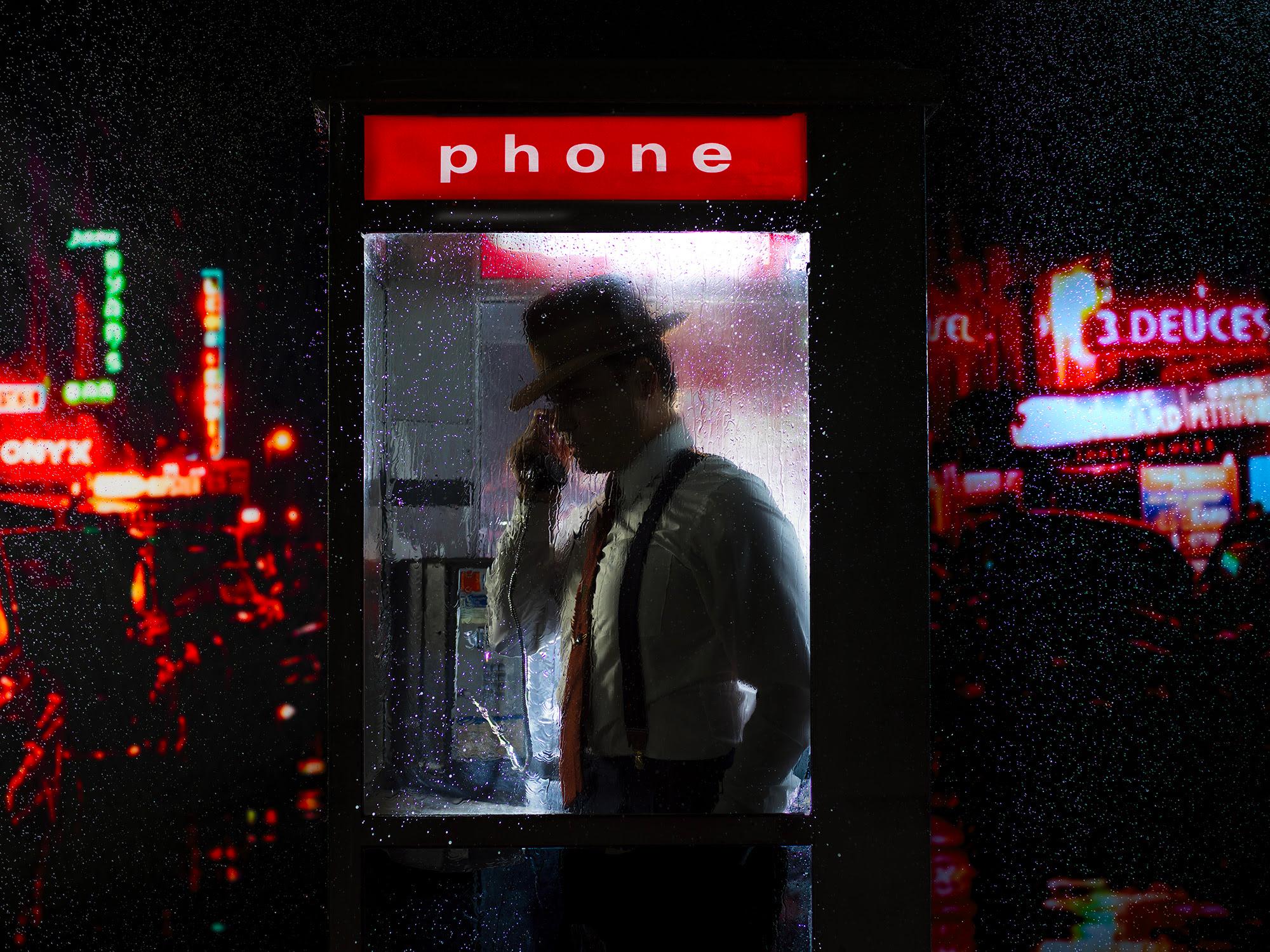 Tyler Shields Black and White Photograph - The Man in the Phone Booth (30" x 40")