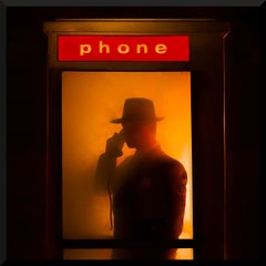 "The Man in the Phonebooth" with Orange Background