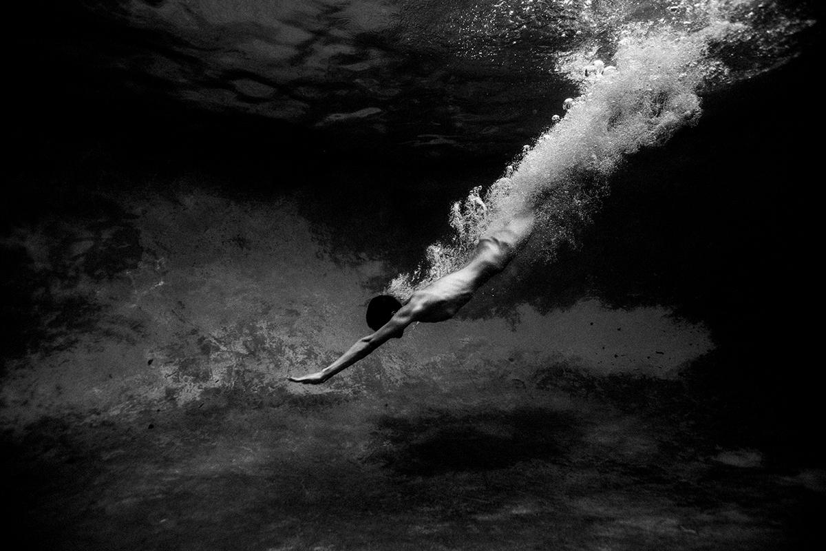 Tyler Shields Figurative Photograph - Torpedo (56" x 72")