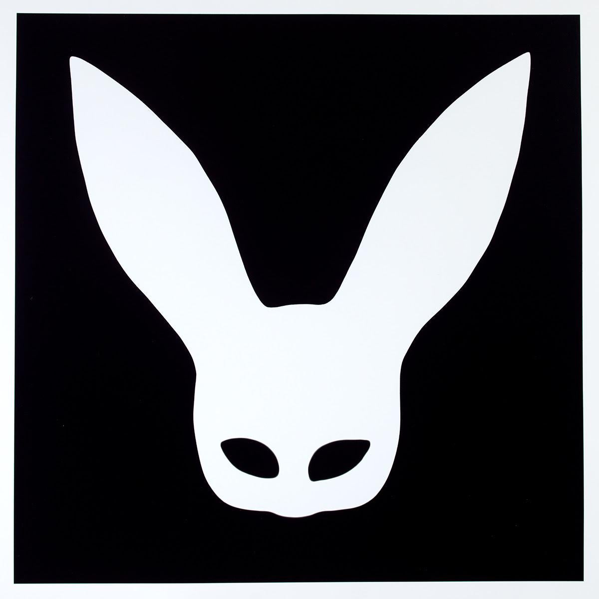 Series: Silhouette
Photogram

"Bunny Photogram this is a Unique piece which is 18 by 18 inches and only one has ever or could ever be made
A photogram is an image made by setting objects directly onto a light-sensitive surface and exposing it to