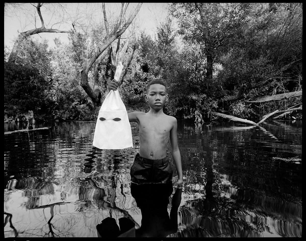 Series: Historical Fiction
Chromogenic Print on Kodak Endura Luster Paper
All available sizes and editions:
24" x 30"
32" x 40"
48" x 60"
57" x 72"
63" x 84"
Editions of 3 + 2 Artist Proofs

"This photograph is the melding of strength and sorrow.