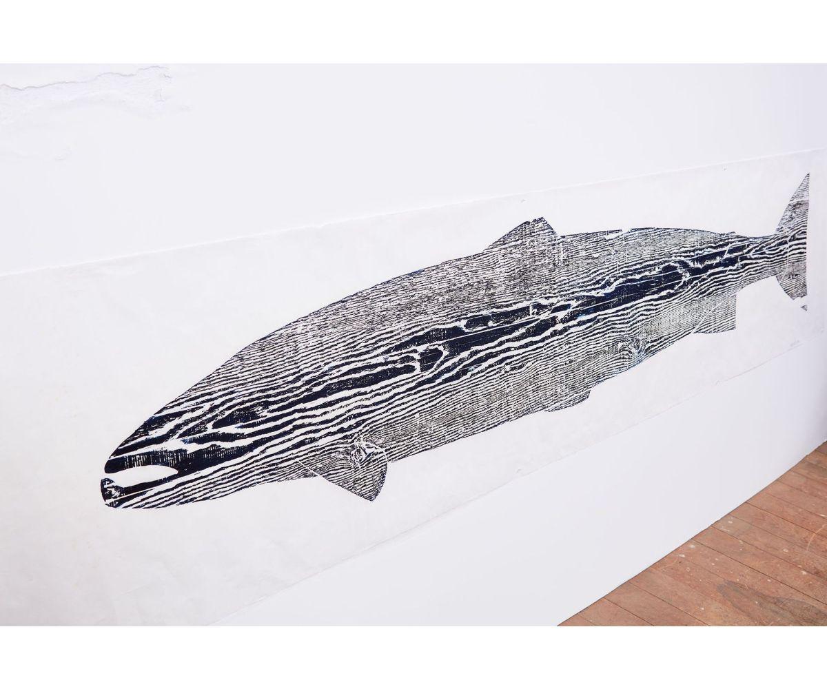 A woodblock by British artist Julian Meredith, titled 'tyne salmon'. The woodblock is a very limited edition print
made by the artist on rice paper and colored with indigo ink. Meredith is noted for his beautiful depictions of whales and fish and