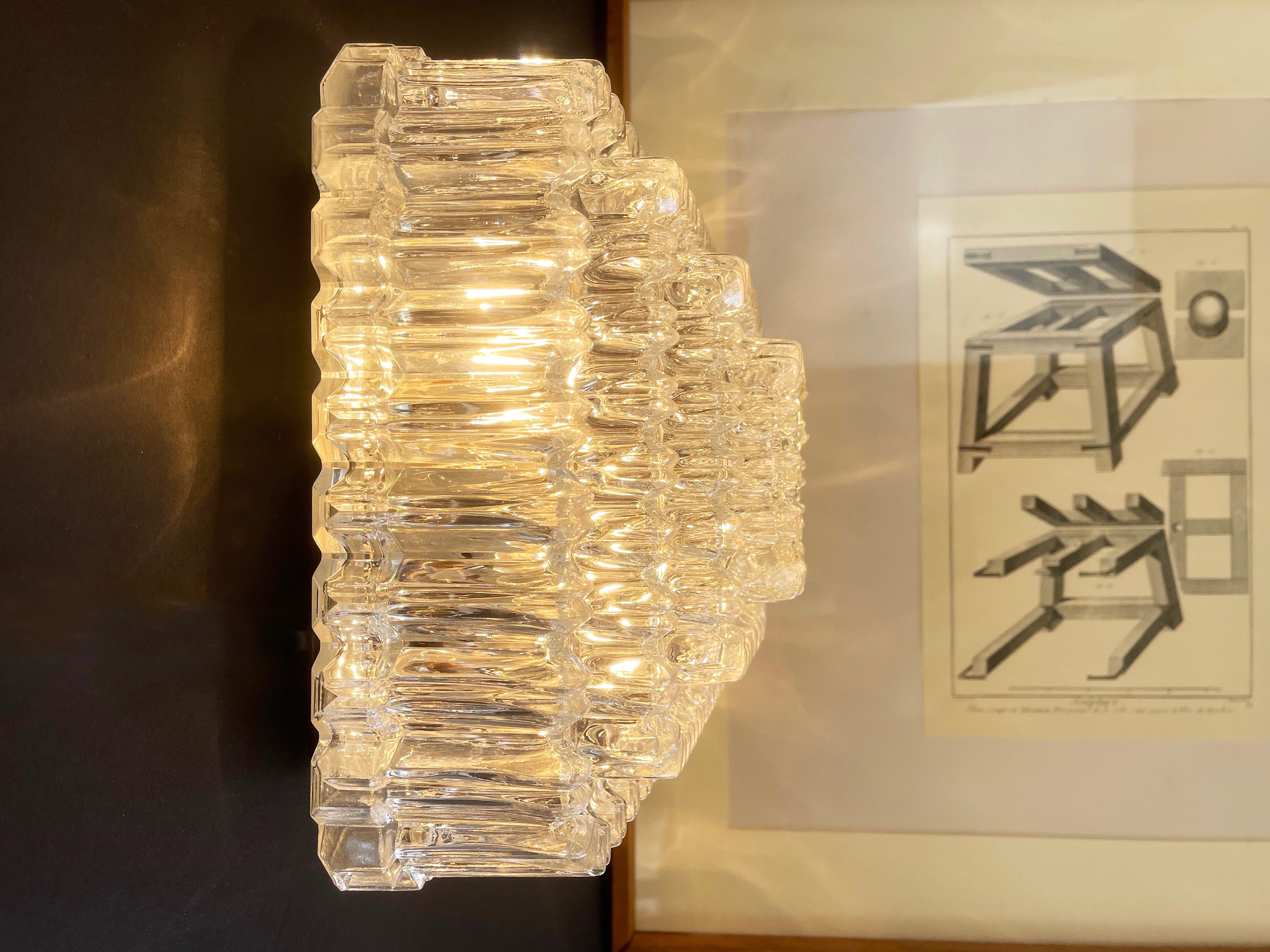 Magnificent, flush base ceiling or wall lamp by ''Glashütte Limburg'', Germans famous mid century manufacturer of high-end design lighting.
Comes in a square rocky icicle like shape in 4 levels, each layer consisting of ice like spikes all