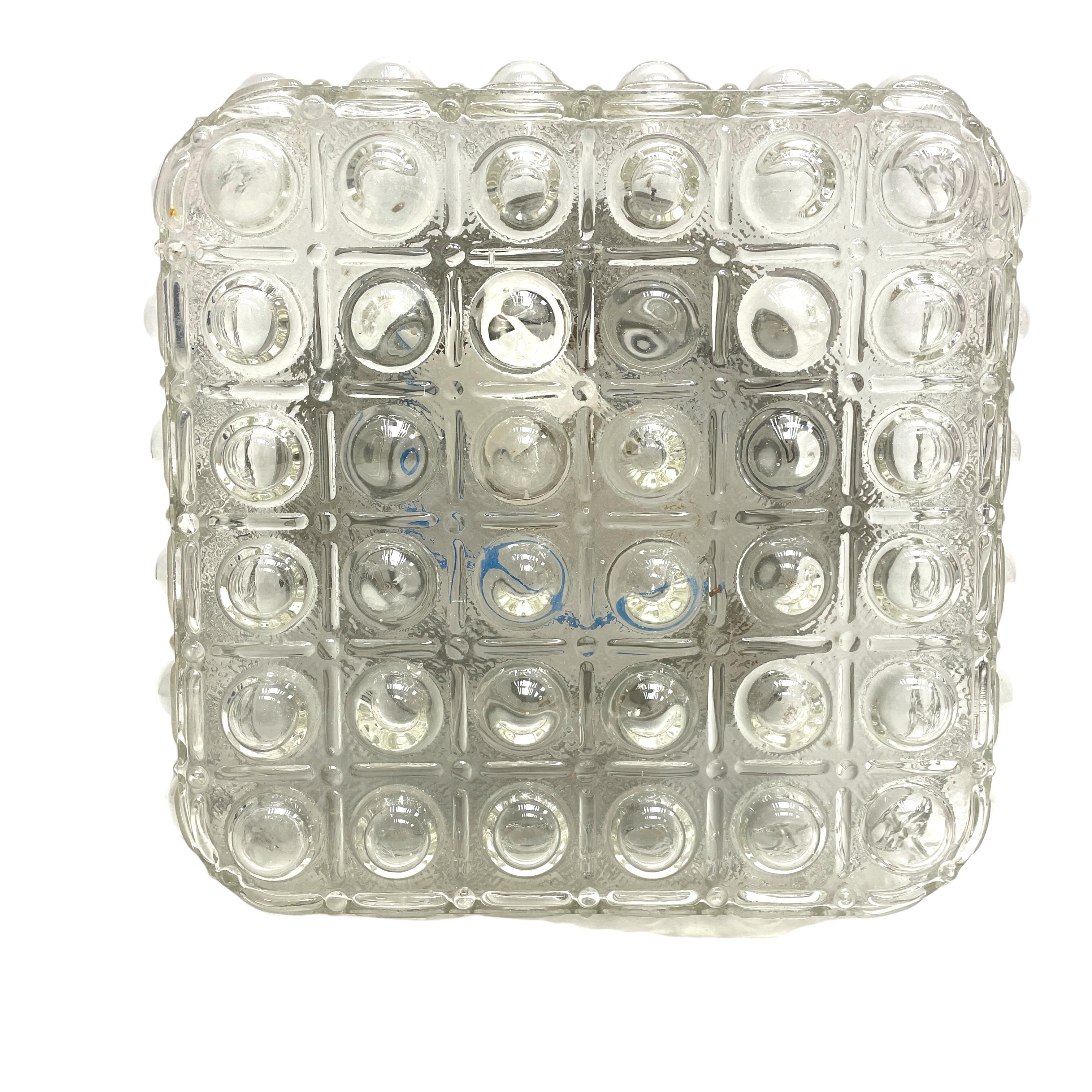Beautiful bubble glass pattern flush mount. Made in Germany by Glashütte Limburg. Gorgeous textured glass flush mount with metal fixture. The fixture requires one European E27 Edison or Medium bulb up to 60 watts.