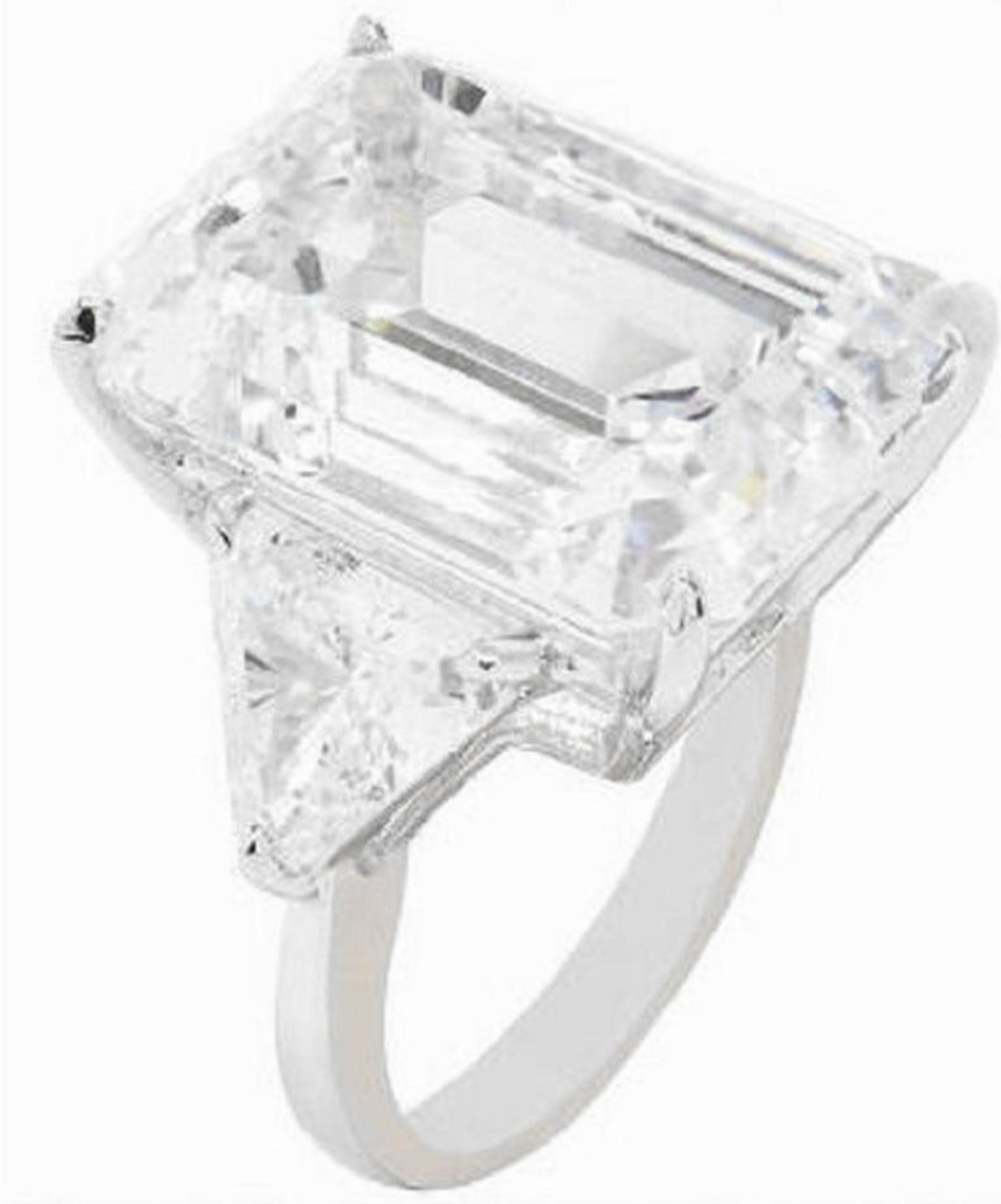 10 ct Total Weight Emerald Cut Diamond three-stone engagement ring is an exquisite piece crafted in platinum. The centerpiece is a stunning 10 ct natural emerald cut diamond that boasts perfect d  color grade and flawless clarity, indicating